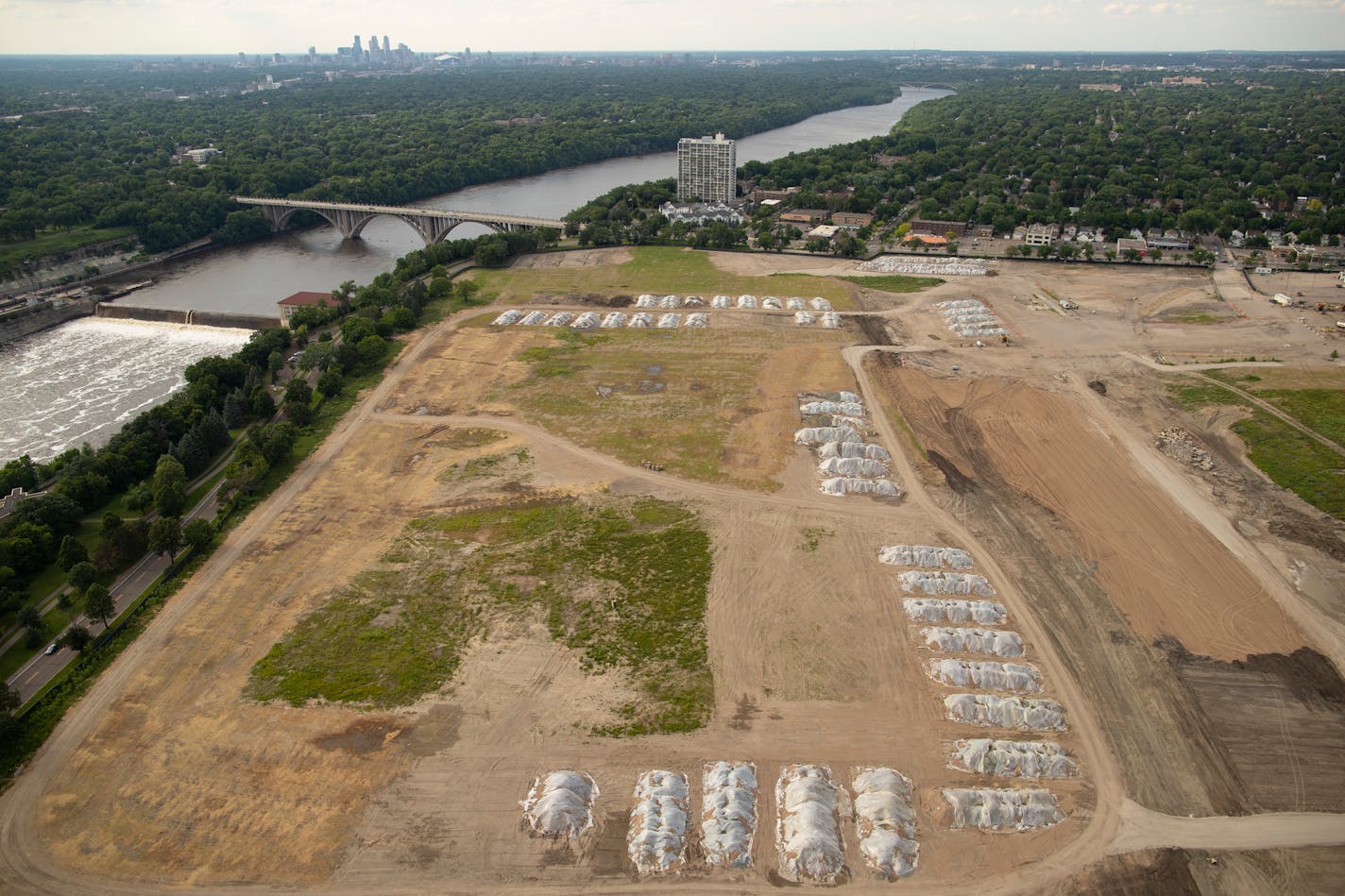 The former Ford assembly plant site, looking northwest, with the downtown Minneapolis in the background.