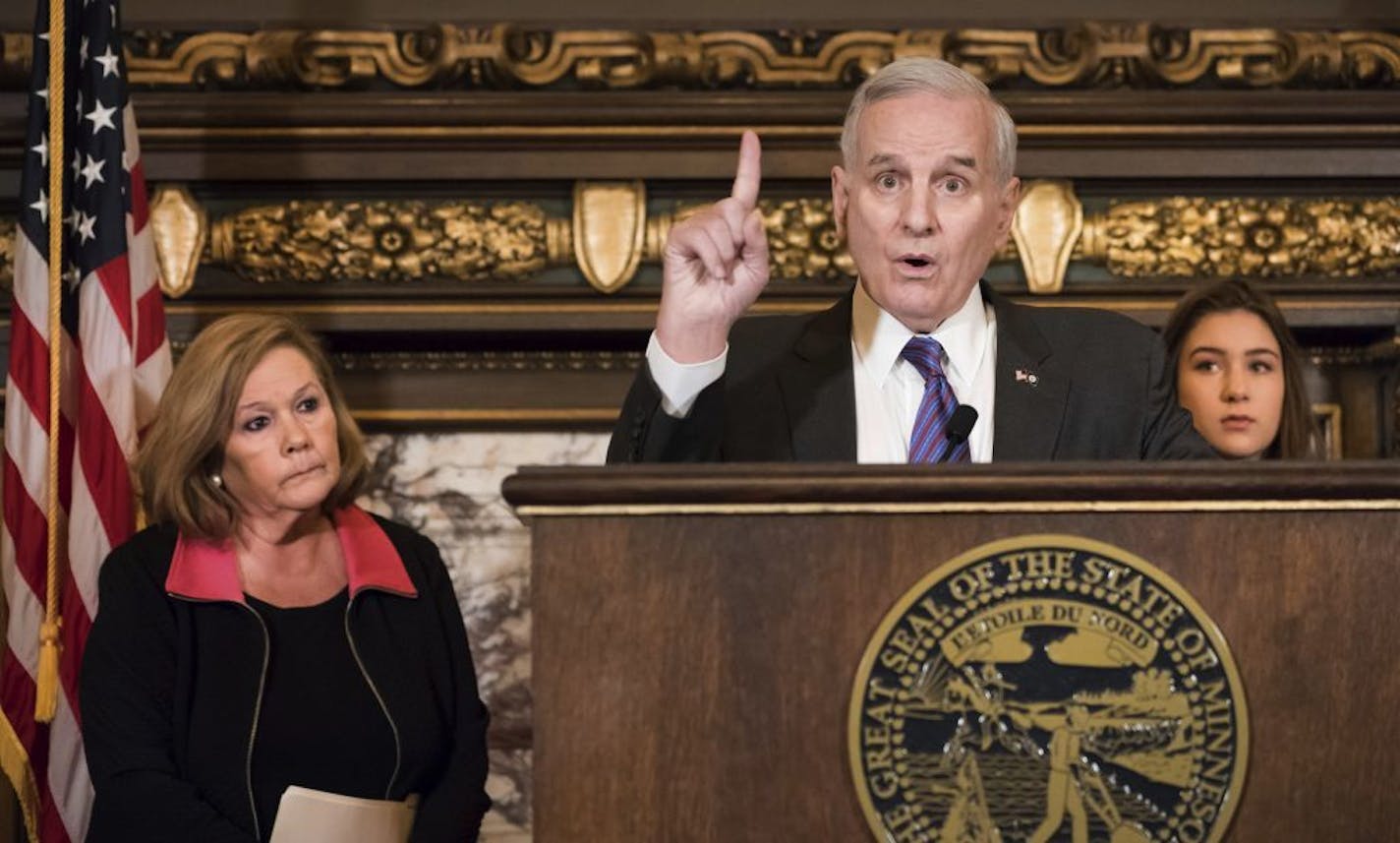 Gov. Mark Dayton on Wednesday, March 7, 2018, proposed $21 million in new funding for security enhancements and mental health improvements in Minnesota schools. On the left is Karen Orcutt, Superintendent of Orono Schools, on the right Eva Goldfarb, junior at St. Louis Park High School.