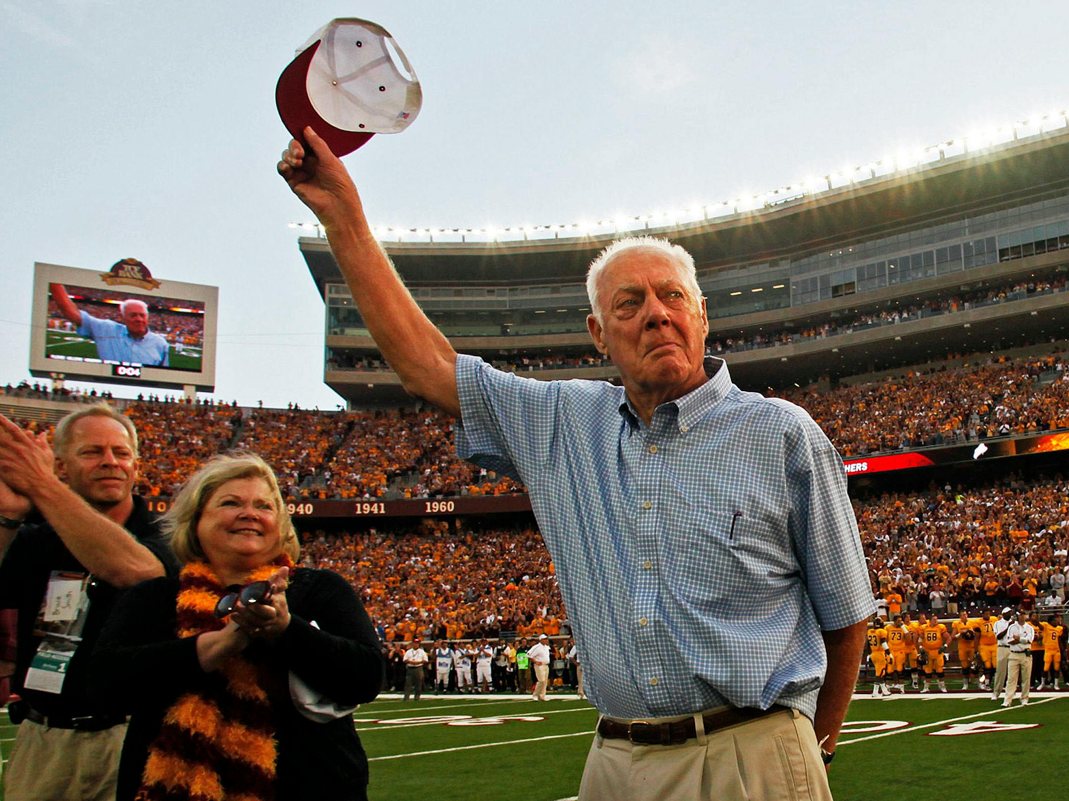 Former Vikings head coach Bud Grant acknowledged the cheers of the crowd during pre-game festivities on the opening day at TCF stadium with a game against Air Force in 2009.
