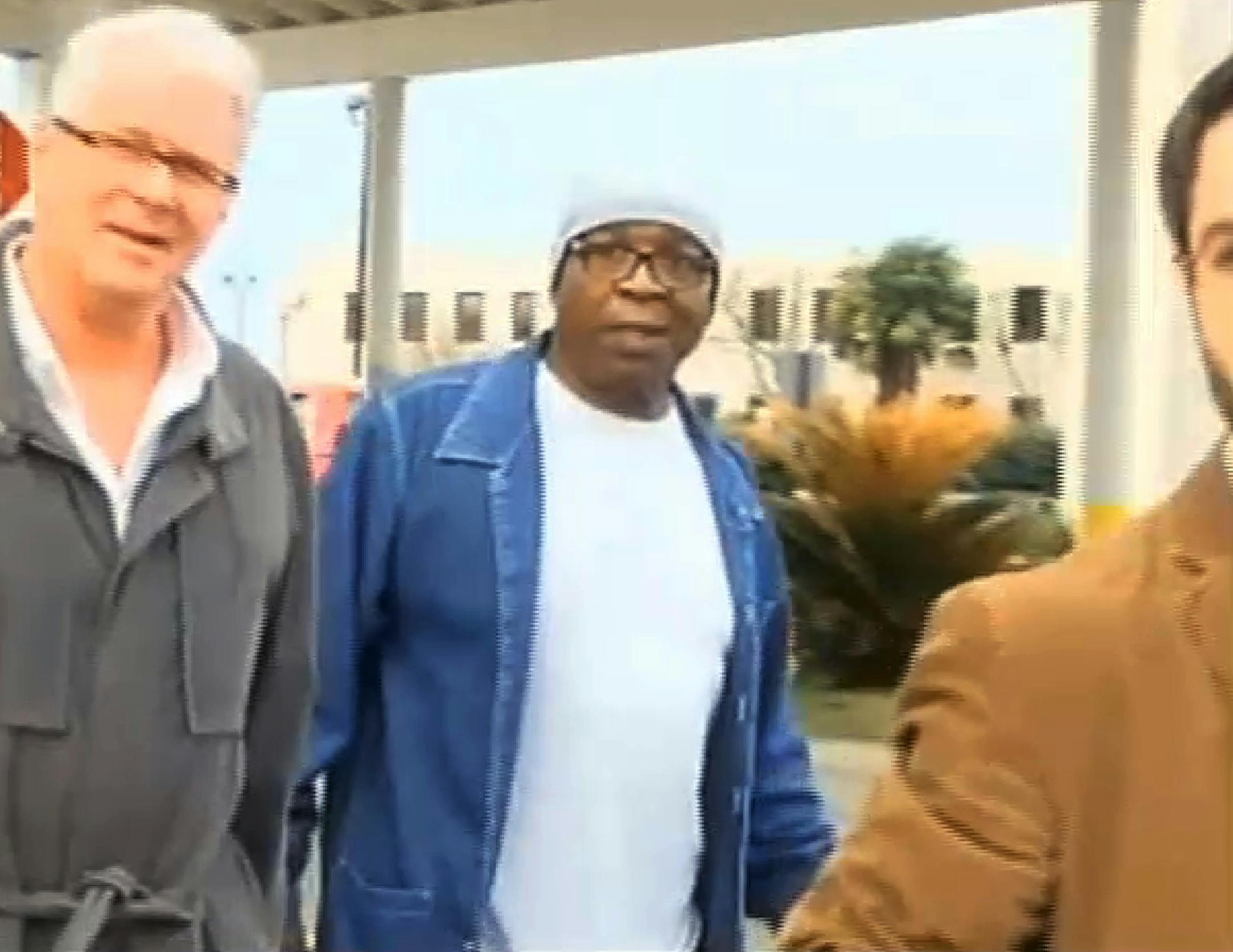 In a frame grab from video, Glenn Ford, center, walked out of prison Tuesday in Angola, La., a free man.