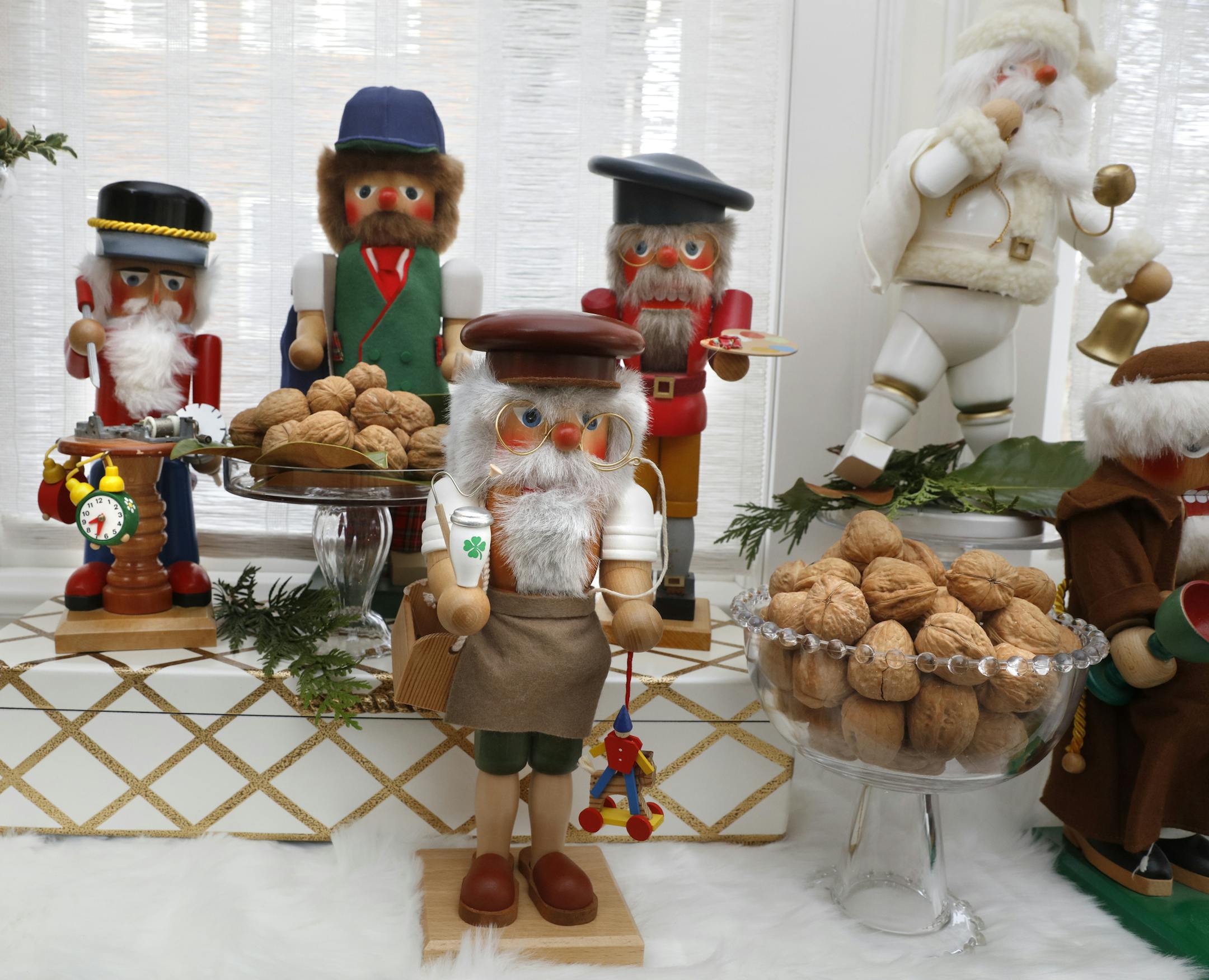 Krystal Kellermann, Interior Designer for Martha O'Hara Interiors, demonstrates how to creatively decorate with common holiday collections. ] Star Tribune TOM WALLACE &#xef; tom.wallace@startribune .com