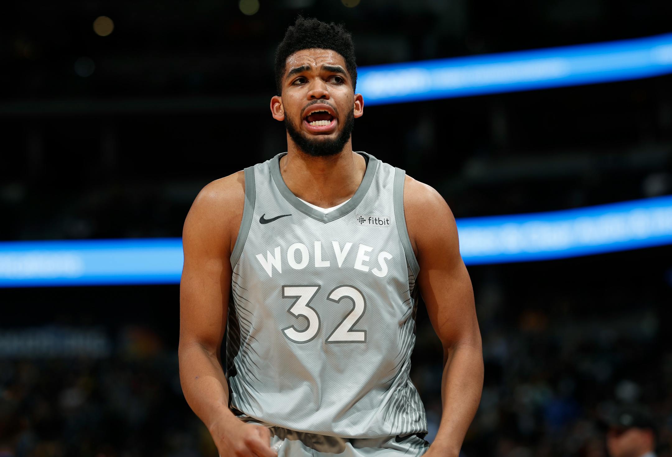 Timberwolves center Karl-Anthony Towns leaves the court after he fouled out vs. Denver