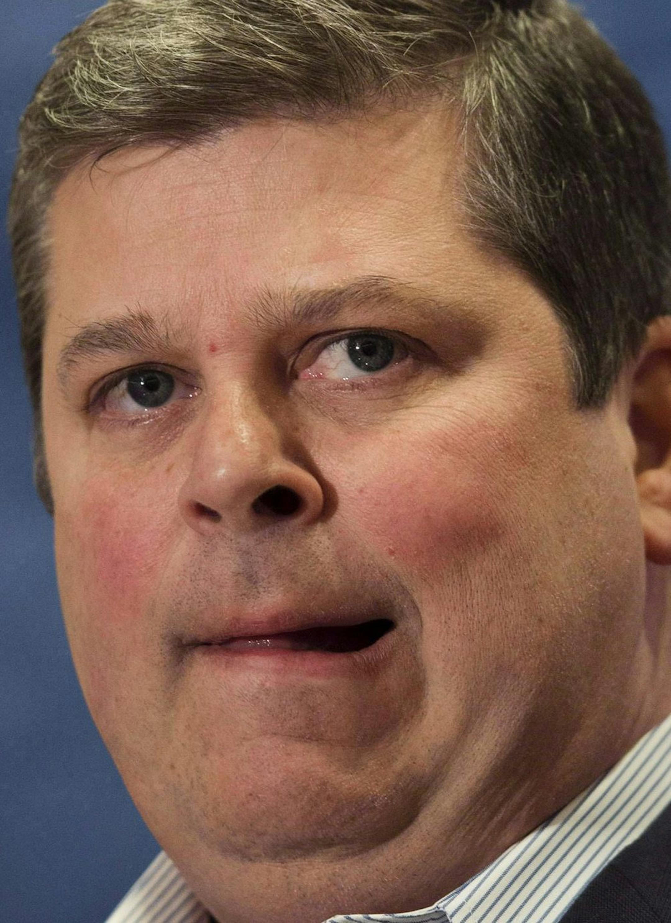 In this Jan. 6, 2015, photo, Toronto Maple Leafs' general manager Dave Nonis speaks to reporters at the Maple Leafs' practice facility in Toronto. The Maple Leafs have fired Nonis, interim coach Peter Horachek and his staff after the team's worst season in almost 20 years. (AP Photo/The Canadian Press, Darren Calabrese)