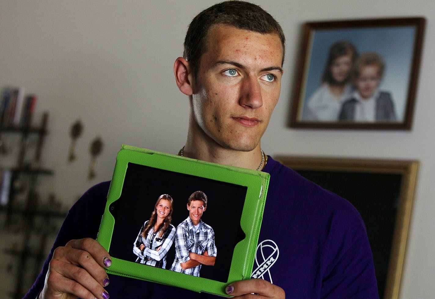 Steven Matula held his favorite photo of him and his sister Mandy. The quieter sibling now speaks for the grieving family.