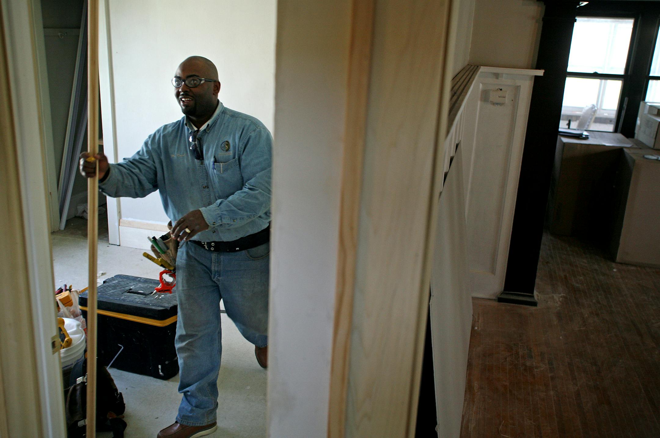 Lester Royal, co-owner of Tri-Construction, worked on a remodeling project at a home in south Minneapolis.
