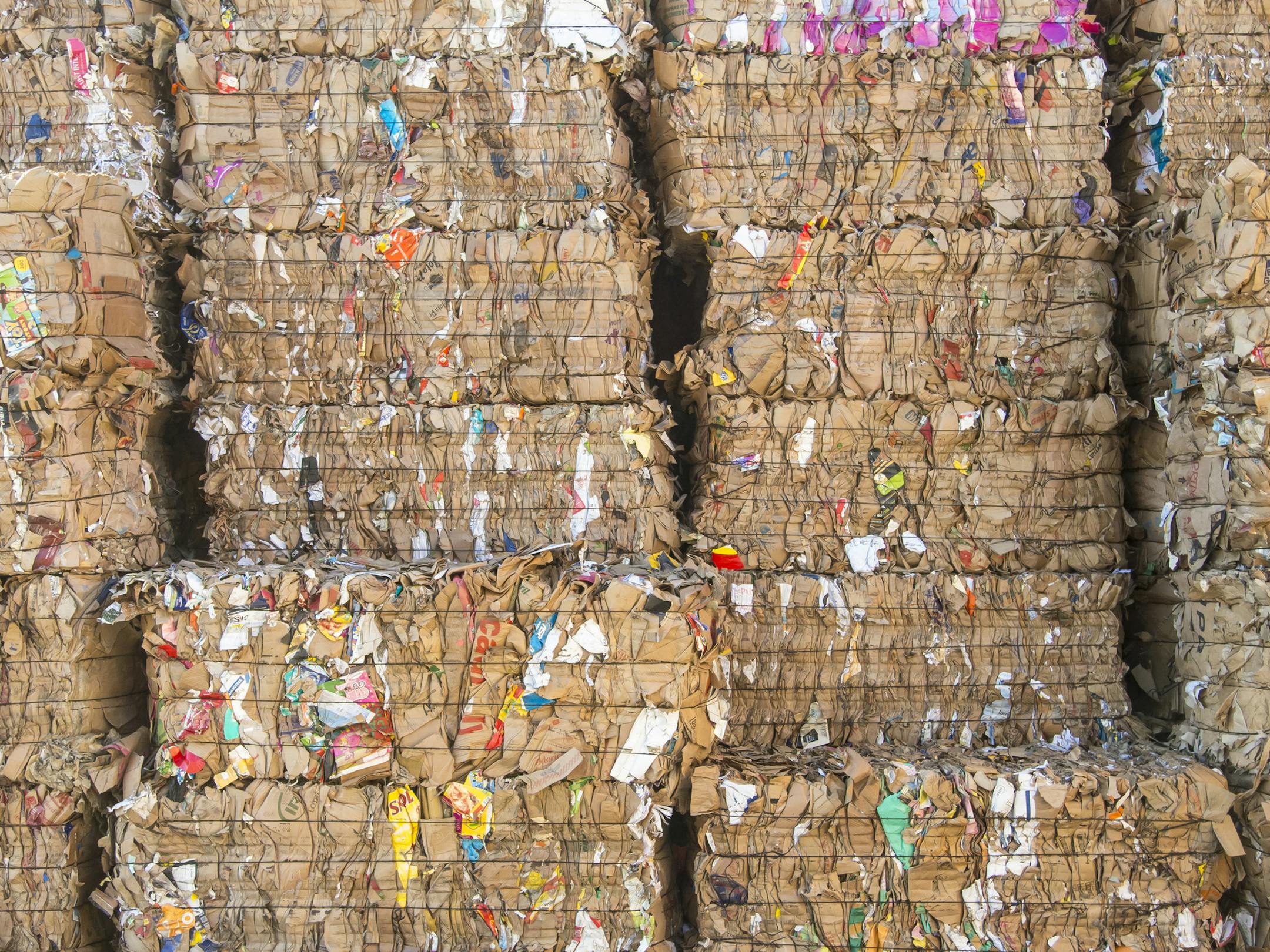 A bale of paper to be reprocessed in a paper machine