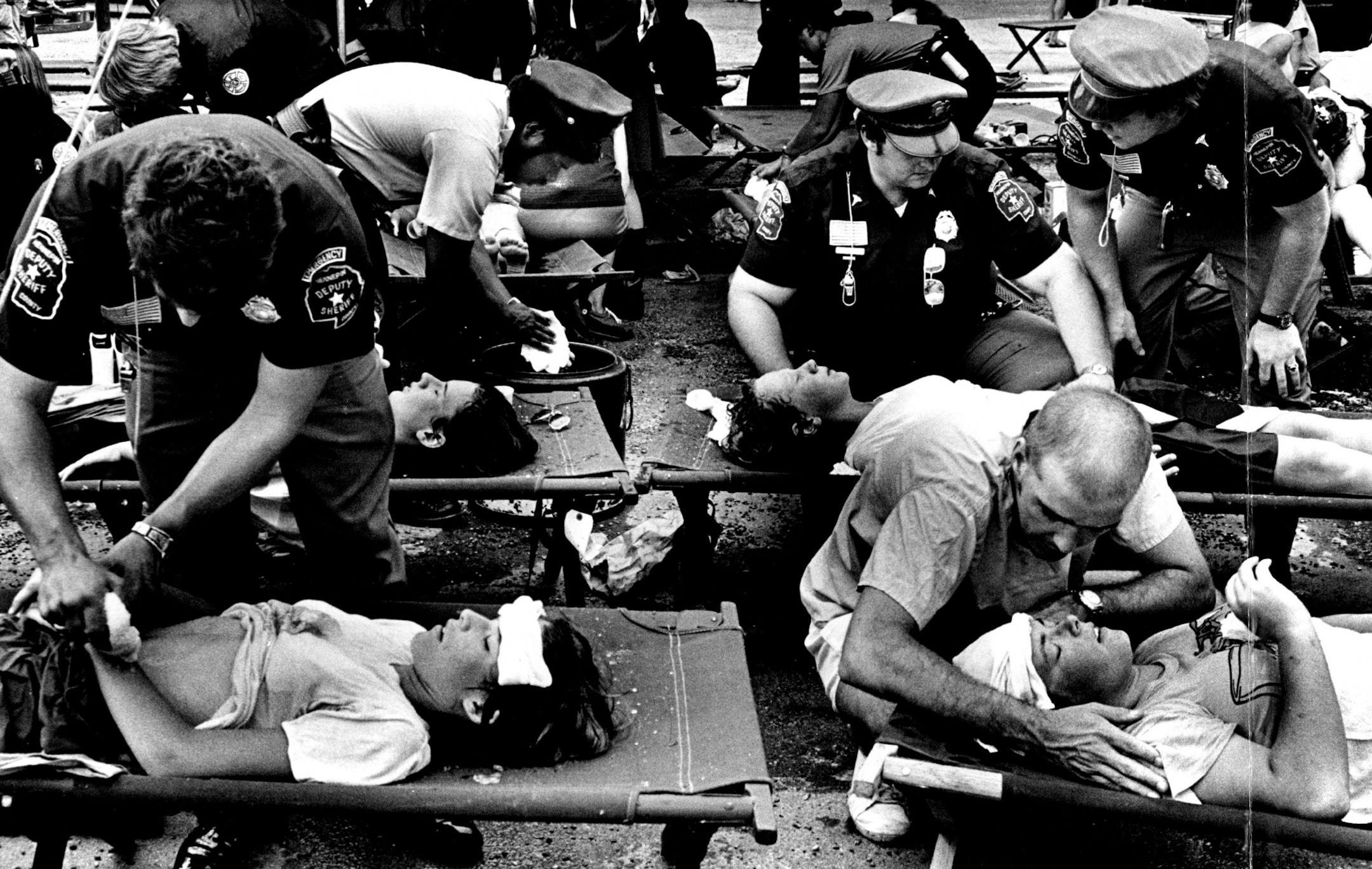 July 17, 1977: Felled by the heat during the Aquatennial parade, members of high school bands were treated at an emergency first-aid station at 9th St. and 2nd Av. S. About 100 Aquatennial Grande Day parade marchers were treated for heat exhaustion.