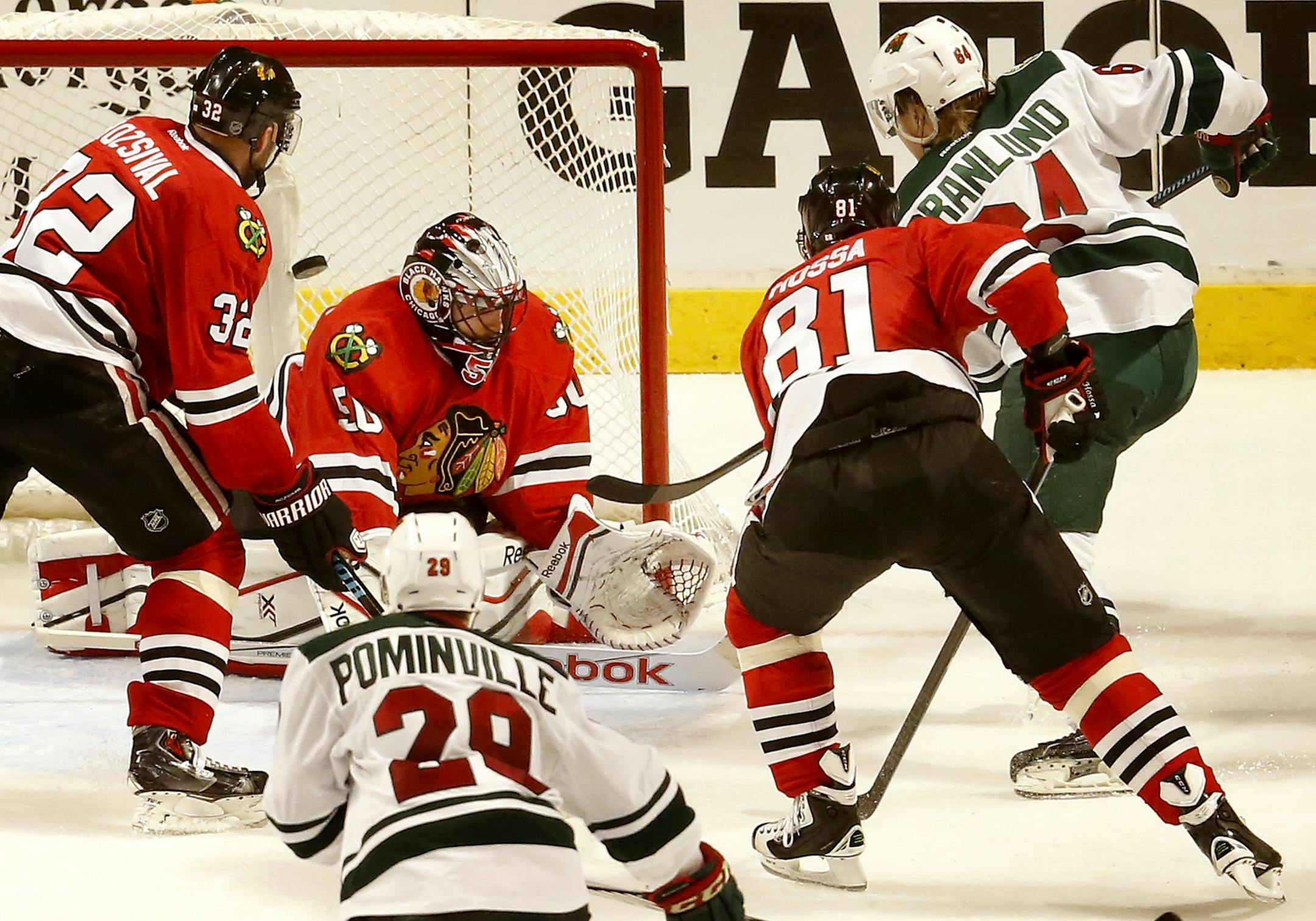 Mikael Granlund (64) got the puck past Chicago goalie Corey Crawford (50) for a goal in the second period.