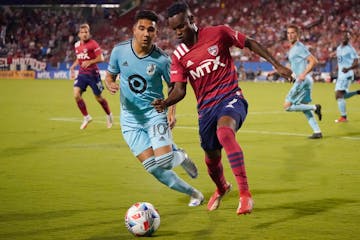 Minnesota United midfielder Emanuel Reynoso (10) and FC Dallas forward Jader Obrian (7) battled for the ball during last Saturday’s match in Frisco,