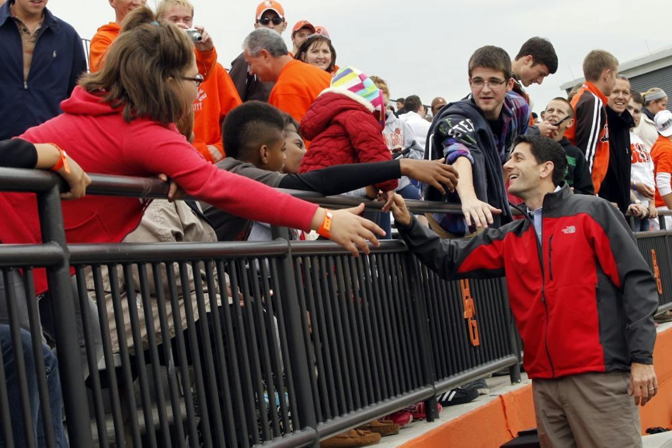 Republican vice presidential candidate, Rep. Paul Ryan, R-Wis., greets spectators at the Bowling Green State University and Miami University of Ohio football game, Saturday, Oct. 13, 2012 in Bowling Green, Ohio.