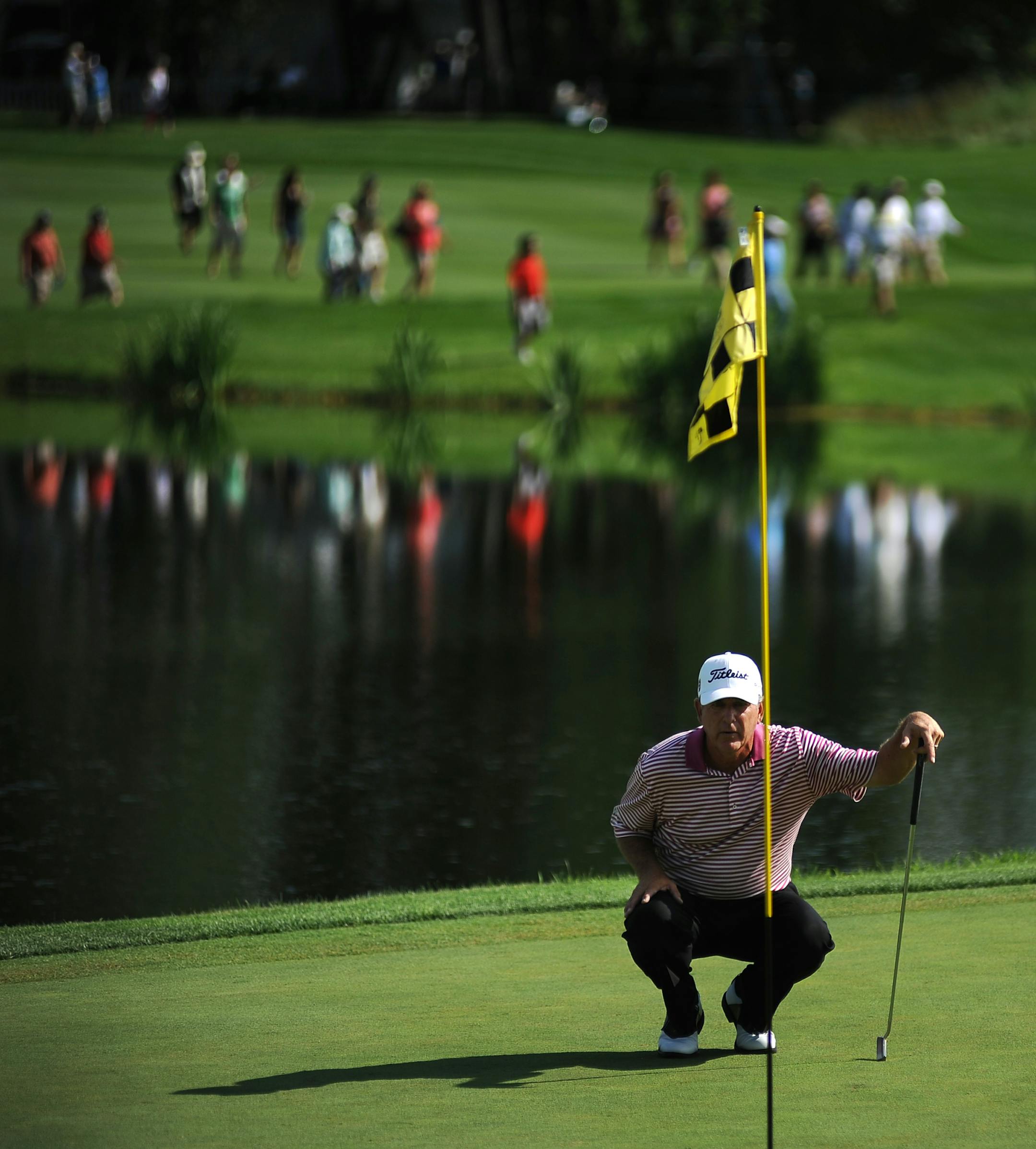 Jay Haas took a closer look at one of his last putts at the 18th hole August 7, 2011 during the final round of the 3M championship held at TPC Twin Cities in Blaine. Jay Haas took first with Kenny Perry in second and Tom Lehman came in third.] (Leah Millis ‚Ä¢ leah.millis@startribune.com) ORG XMIT: MIN2013072518024412
