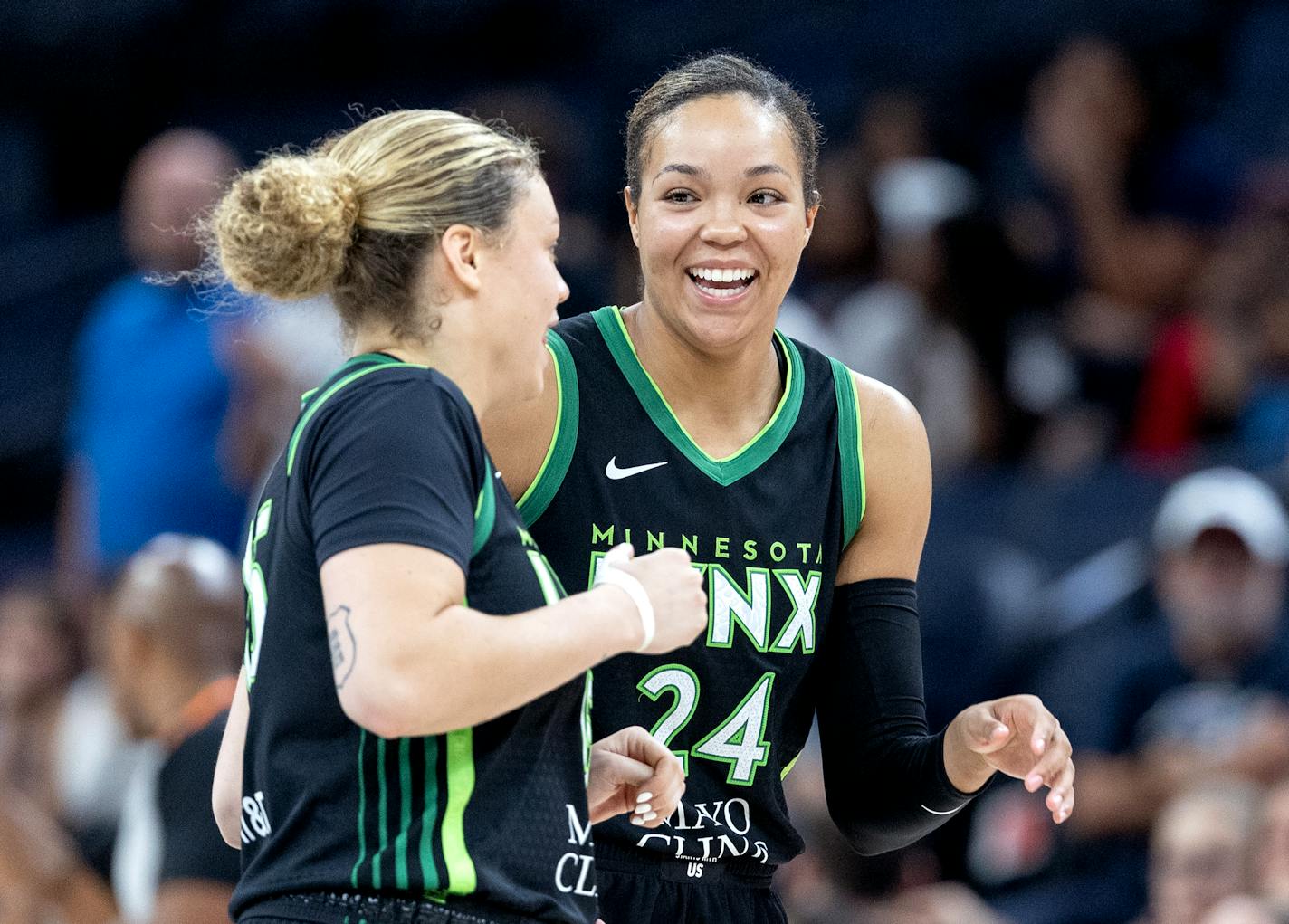 Rachel Banham (15) and Napheesa Collier (24) of the Minnesota Lynx after Collier made two free throws with 22 seconds left in the game Tuesday, August 22, 2023, at Target Center in Minneapolis, Minn. ] CARLOS GONZALEZ • carlos.gonzalez@startribune.com