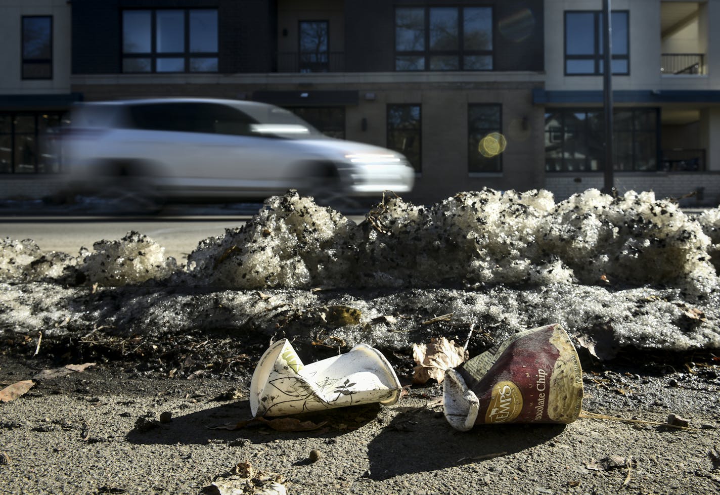 Litter was strewn about near piles of melting snow along Lagoon Avenue in Uptown Friday afternoon. ] Aaron Lavinsky &#xa5; aaron.lavinsky@startribune.com Fast melt ... SO MUCH LITTER! What's emerging from the piles of snow, and how will it get cleaned up? We photograph litter in Uptown Minneapolis on Friday, March 22, 2019.