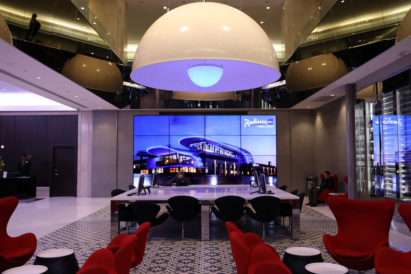 The lobby area of the Radisson Blu hotel in downtown Minneapolis in a file photo from March 2018. Staff photo by Anthony Souffle) Photo tour of the Radisson Blu hotel Wednesday, March 7, 2018 in downtown Minneapolis. The Radisson Blu hotel company recently underwent a rebranding, launch of loyalty program, and other company changes including expanding the number of hotels in the United States. ORG XMIT: MIN1803081348486321