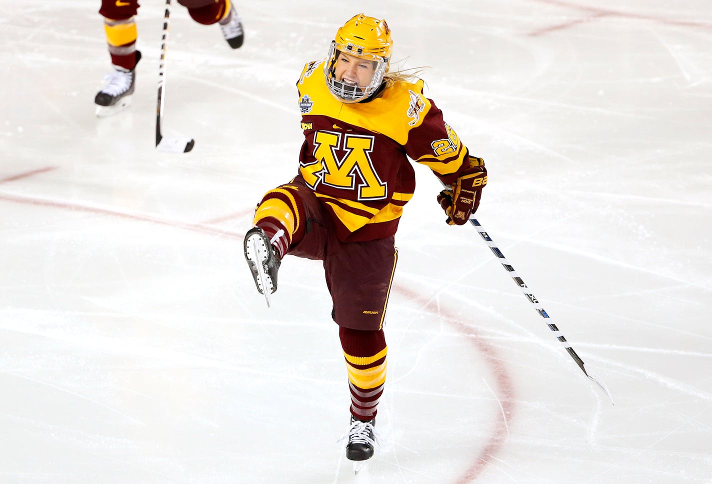 Minnesota's Sarah Potomak celebrates her goal 13 seconds into the game during the first period of the NCAA women's Frozen Four championship college hockey game against Boston College in Durham, N.H. Sunday, March 20, 2016. (AP Photo/Winslow Townson)