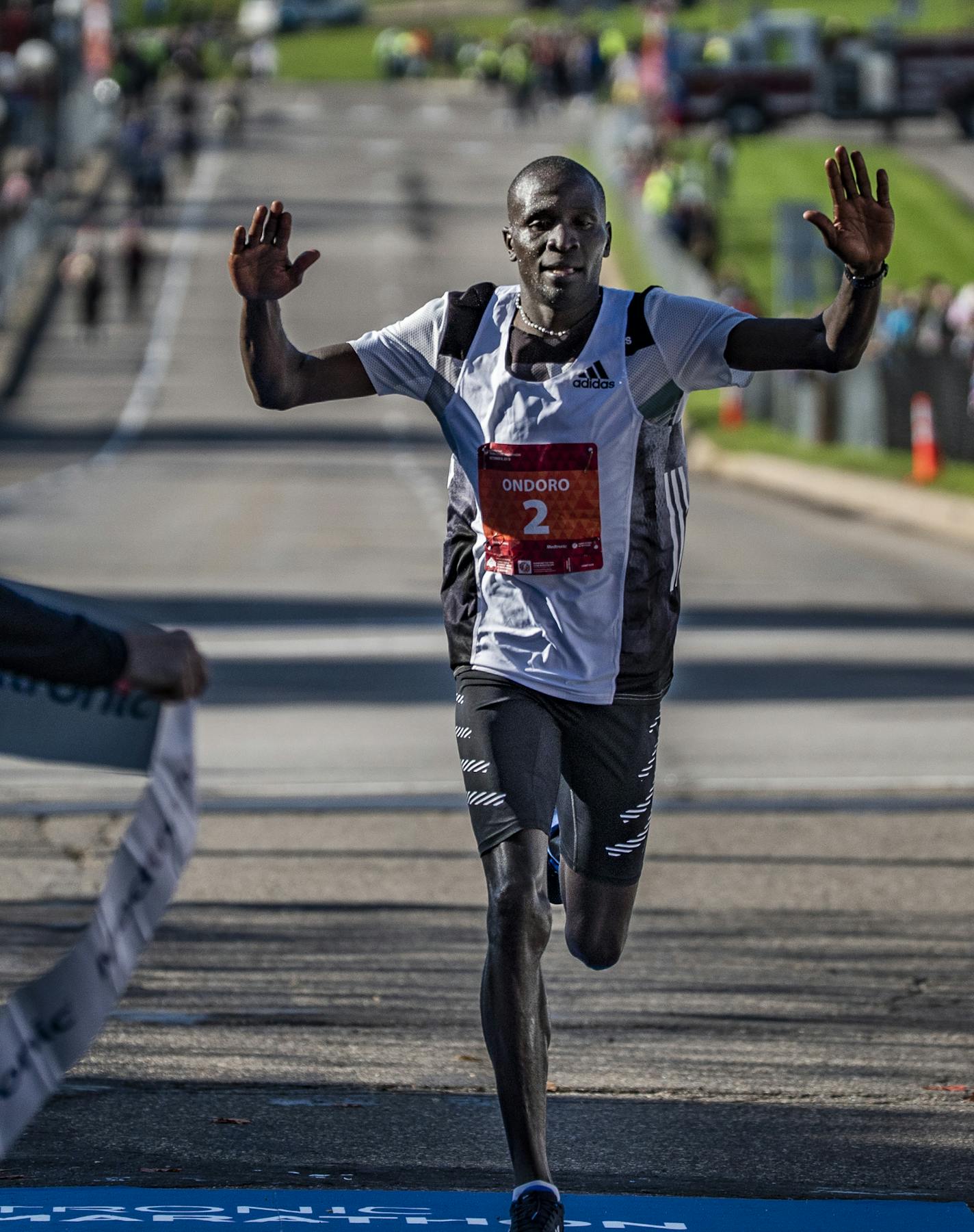 Dominic Ondoro finished in first place in the men's category for the Twin Cities Marathon in a time of 2:12:23.] Twin Cities Marathon RICHARD TSONG-TAATARII &#xa5; richard.tsong-taatarii@startribune.com