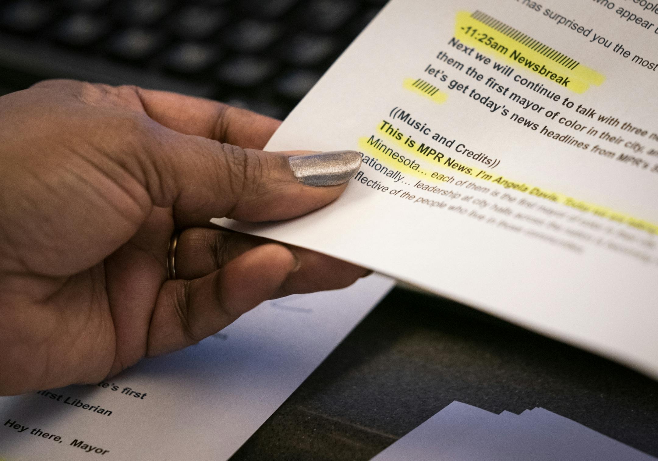 Angela Davis looks over her notes while hosting her show "MPR News with Angela Davis."