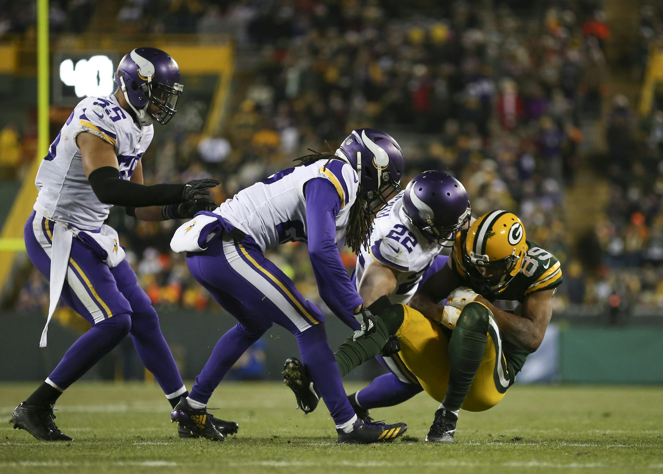Vikings free safety Harrison Smith (22) tackled Green Bay Packers wide receiver Michael Clark (89) after he caught a fourth quarter pass for a seven yard gain. . ] JEFF WHEELER &#xef; jeff.wheeler@startribune.com The Minnesota Vikings shut out the Green Bay Packers 16-0 Saturday night, December 13, 2017 at Lambeau Field in Green Bay.