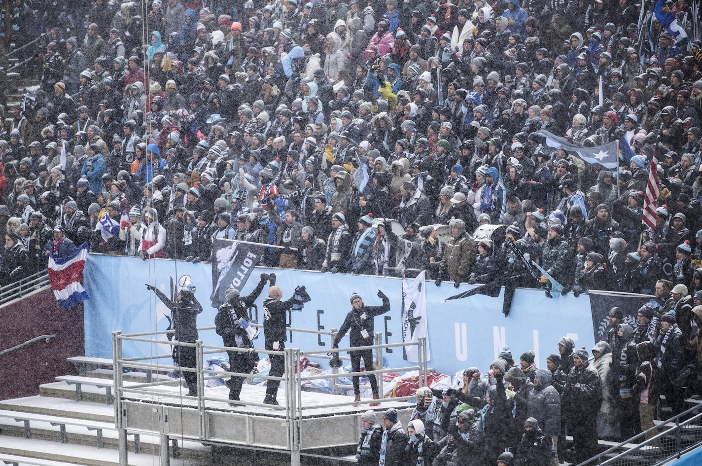 Minnesota United super fans, Dark Clouds and True North Elite members, packed into the supporters section behind the goal for the home opener of the inaugural season on March 12th. The snow and cold couldn&#x2019;t keep 35,043 fans from showing up to support Minnesota United for their MLS home opener against fellow expansion side Atlanta United. The packed house at TCF Bank Stadium was the largest crowd for a soccer match in Minnesota since the Strikers defeated the Tampa Bay Rowdies in front of