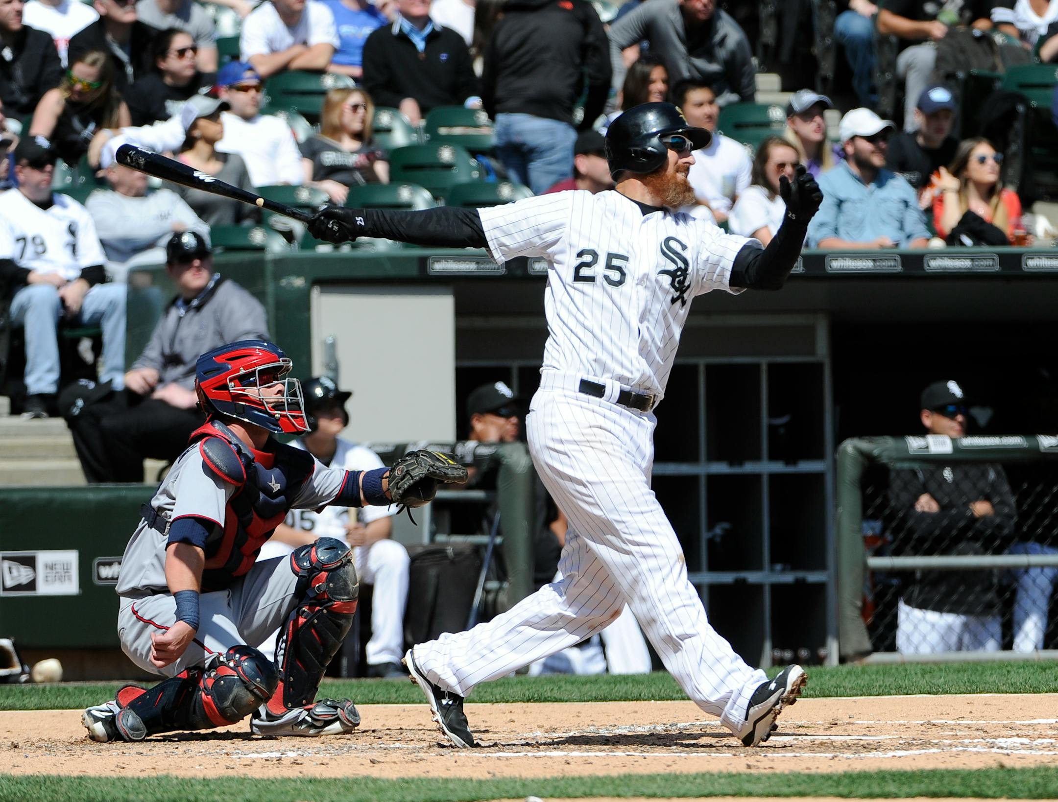Chicago White Sox's Adam LaRoche (25) watches his home run against the Minnesota Twins during the second inning of a baseball game, Saturday, April 11, 2015 in Chicago. (AP Photo/David Banks)