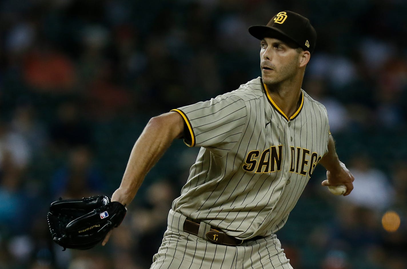 San Diego Padres' Taylor Rogers pitches against the Detroit Tigers during the ninth inning of a baseball game Tuesday, July 26, 2022, in Detroit. Rogers recorded his first win in the Padres 6-4 win. (AP Photo/Duane Burleson)