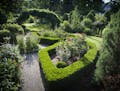 The garden of Jerry and Lee Shannon in St. Paul. This is the formal side of the garden with groomed boxwoods. ] GLEN STUBBE &#xa5; gstubbe@startribune
