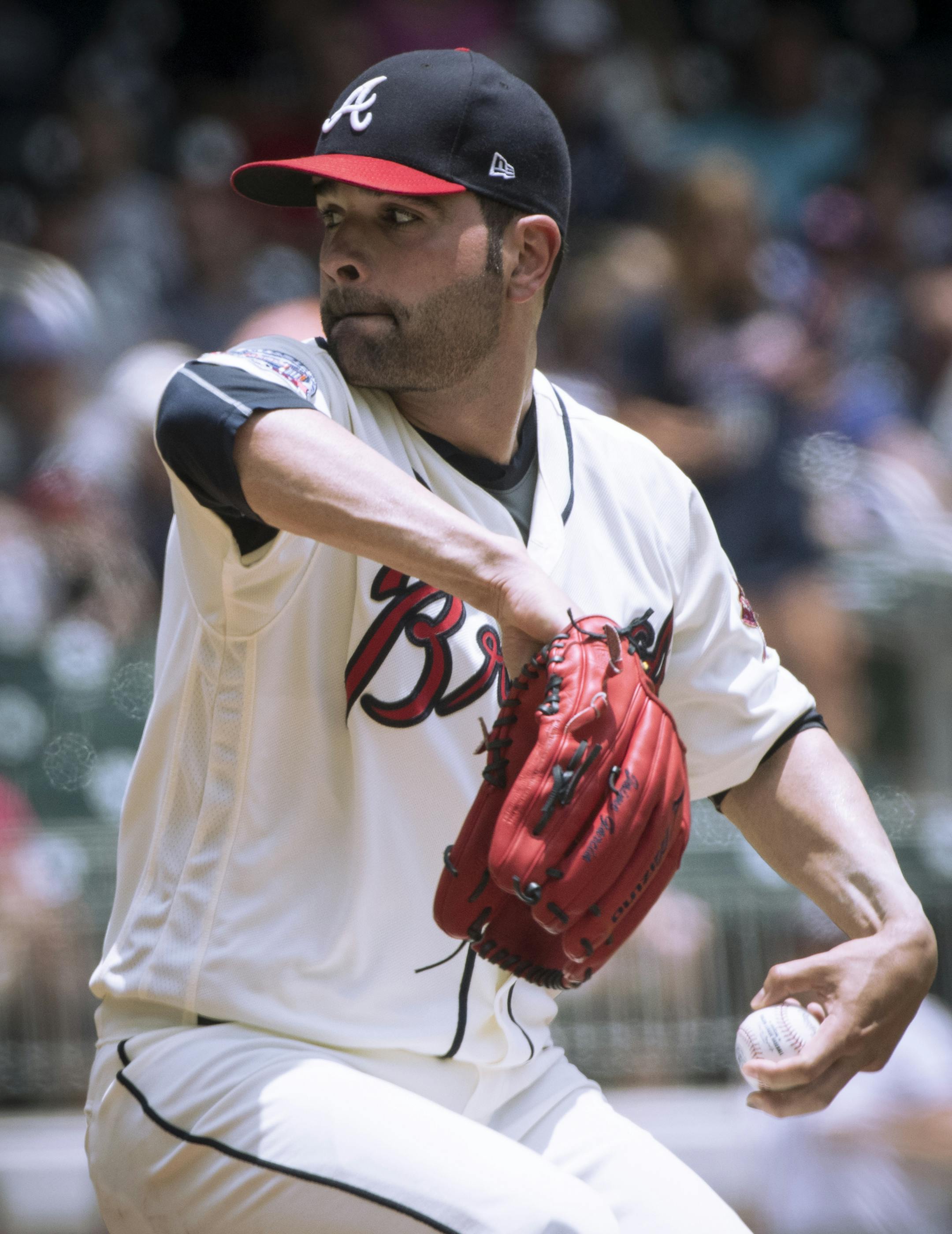 Atlanta Braves' Jaime Garcia pitches against the New York Mets during the first inning of a baseball game, Sunday, June 11, 2017, in Atlanta. (AP Photo/John Amis)