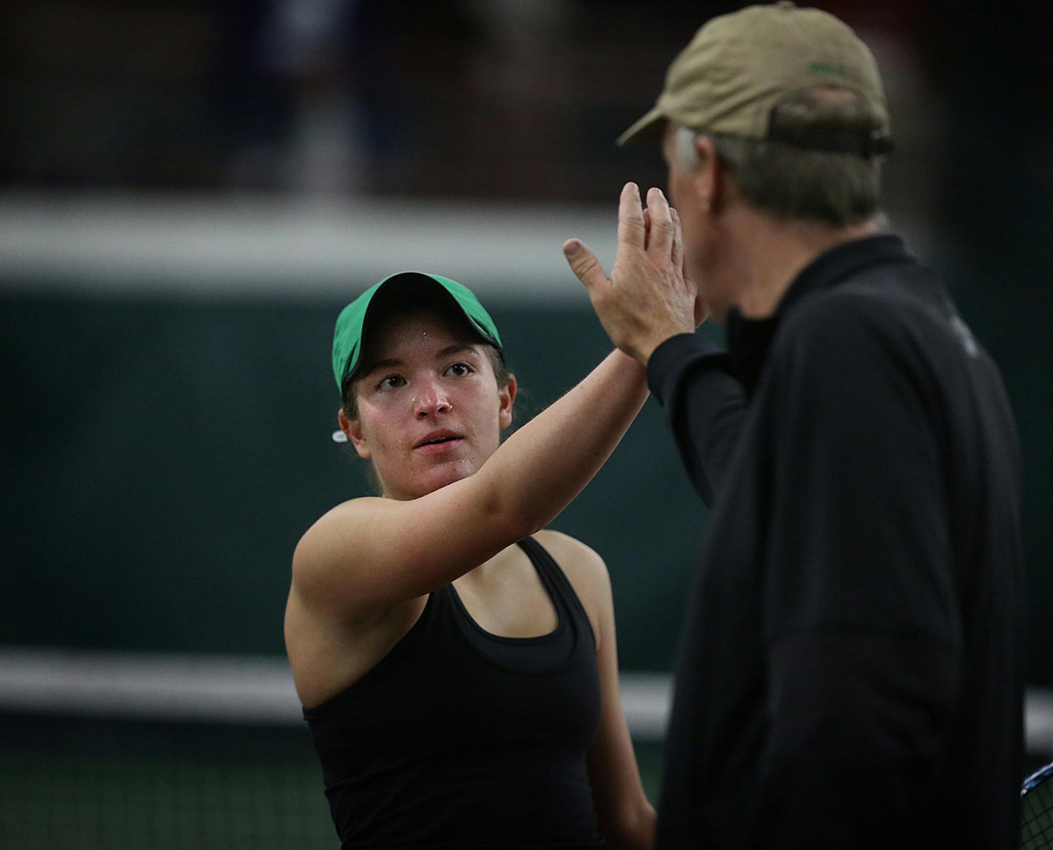 Caitlyn Merzbacher (defending state singles champion) received some encouragement and advice from her coach, Steve Paulsen, during her match against Blake in the Section 6, 2A team finals at the University of Minnesota Baseline Tennis Center. ] JIM GEHRZ ‚Ä¢ jgehrz@startribune.com / Minneapolis, MN / Oct. 7, 2014 / 9:00 AM / BACKGROUND INFORMATION: Edina played Blake in the Section 6, 2A team finals at the University of Minnesota Baseline Tennis Center.