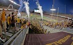 Fans cheered as the Minnesota Gophers took to the field before they took on TCU at TCF Stadium, Thursday, September 3, 2015 in Minneapolis, MN.