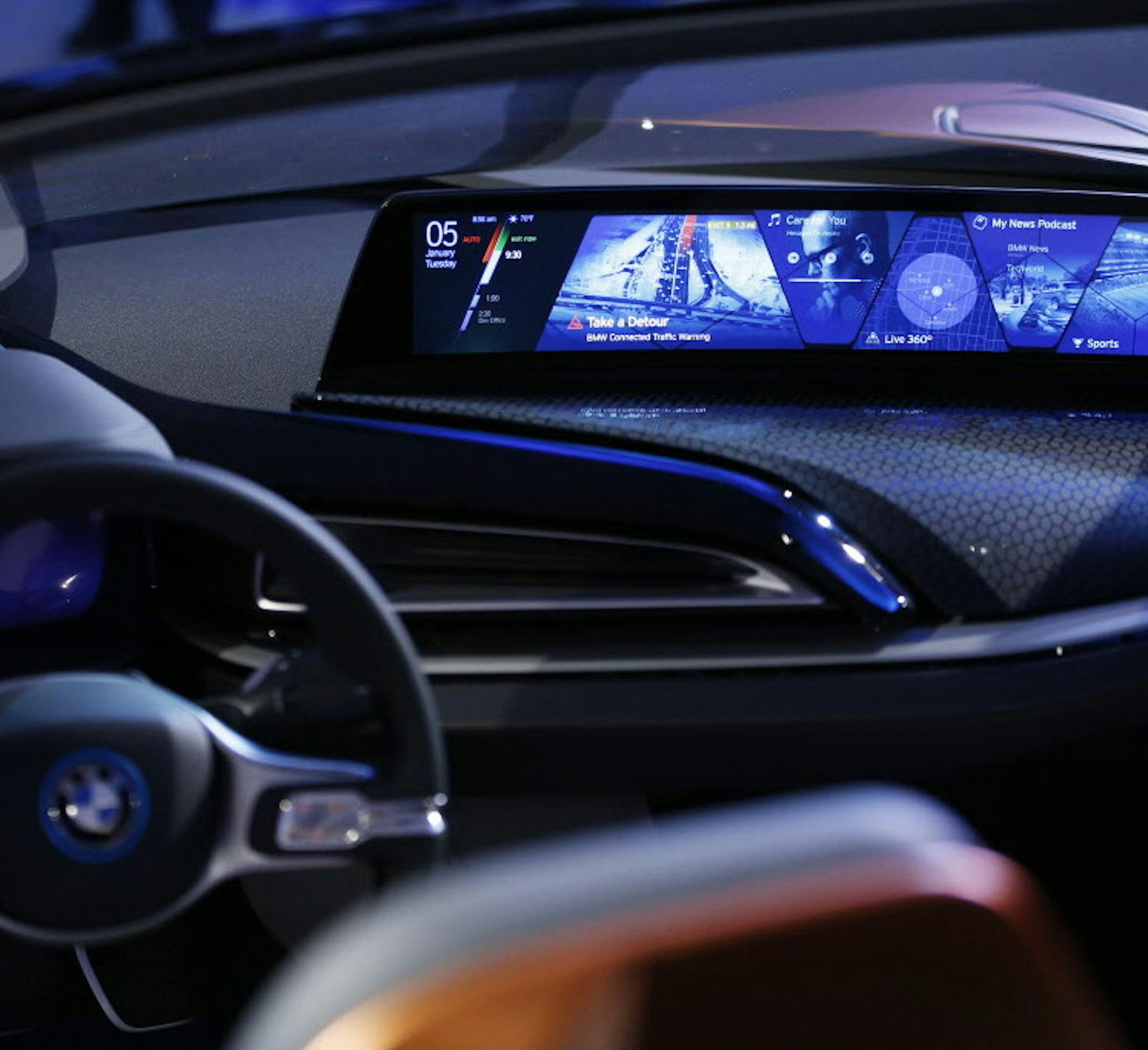 The BMW i Vision Future Interaction concept car is on display during a news conference at CES Press Day at CES International, Tuesday, Jan. 5, 2016, in Las Vegas. (AP Photo/John Locher)