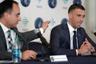 As the NBA season begins, Timberwolves President of Basketball Operations Gersson Rosas, left, and coach Ryan Saunders are talking more about the proc