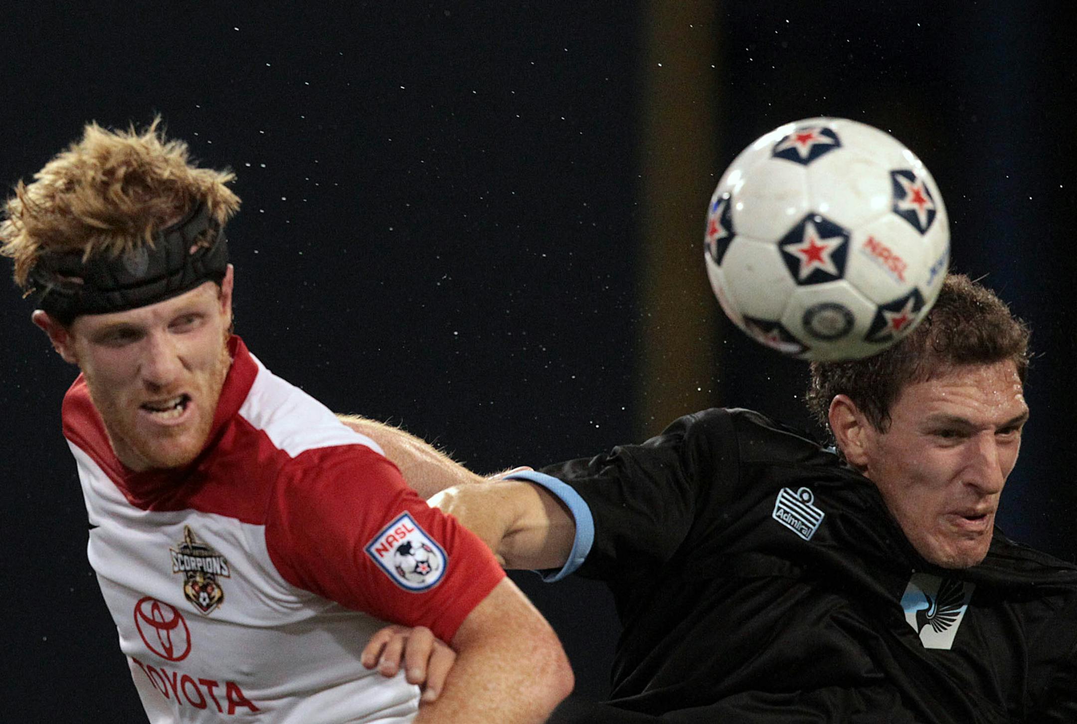 Minnesota‚Äôs Aaron Pitchkolan (right) and San Antonio‚Äôs Patrick Phelan leaped in the air in an effort to control the ball in the second half. ] JIM GEHRZ ‚Ä¢ jgehrz@startribune.com Minneapolis, MN / April 6, 2013, 7:00 PM BACKGROUND INFORMATION- Minnesota United FC met San Antonio in their NASL home opener at the Metrodome. The game ended in a 0-0 tie. ORG XMIT: MIN1304062123106612
