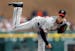 Minnesota Twins pitcher Kyle Gibson throws against the Detroit Tigers in the second inning of a baseball game in Detroit, Friday, June 13, 2014. (AP P