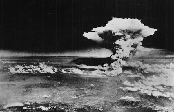 FILE - The mushroom cloud rises from Hiroshima, Japan, on Aug. 6, 1945, after the first atomic bomb was dropped by a B-29 bomber, as seen in this phot