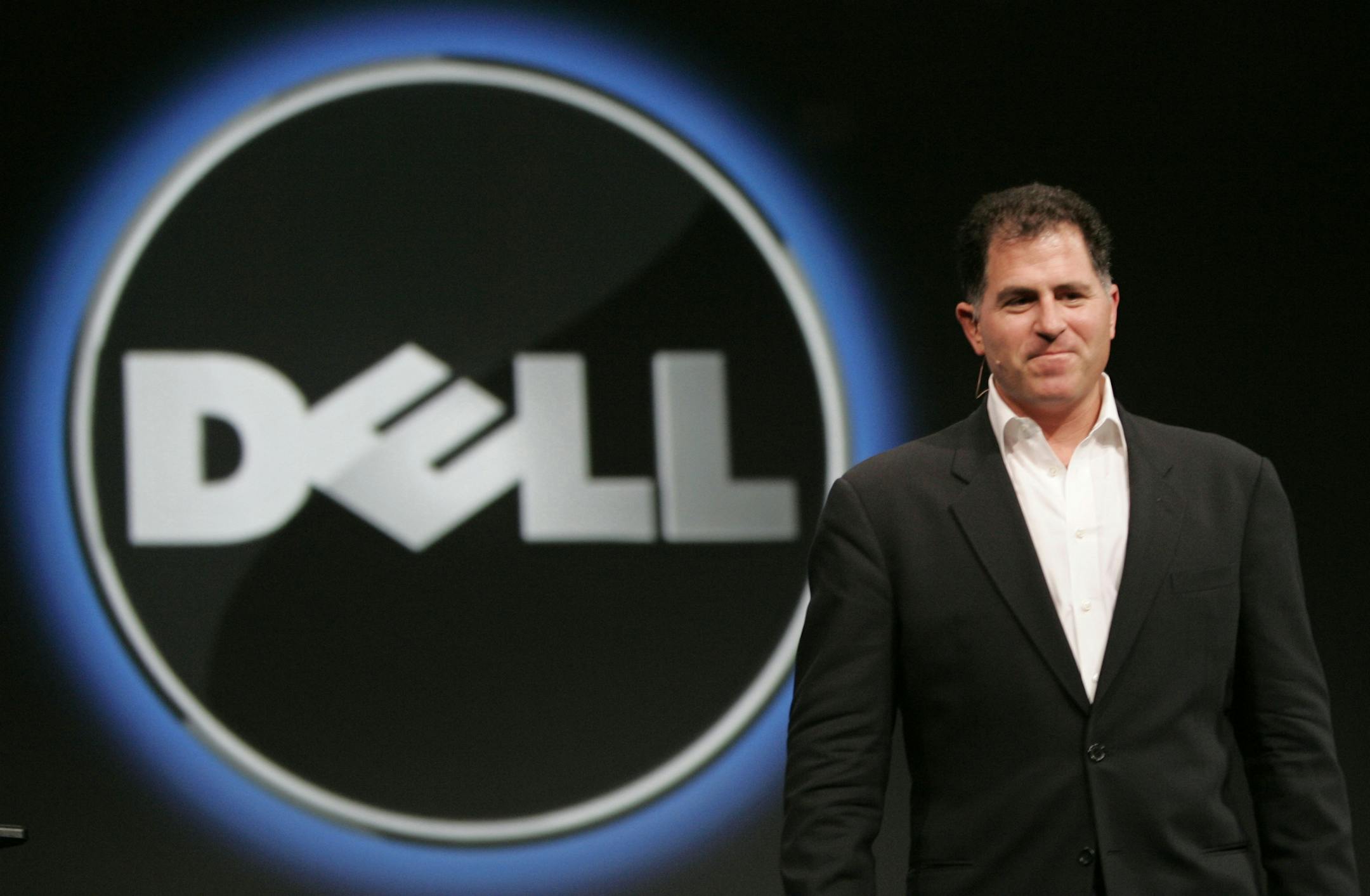 FILE - In this Wednesday, Nov. 14, 2007 file photo, Dell CEO Michael Dell smiles at Oracle Open World conference in San Francisco. Dell Inc. is making a late push to win shareholder support for founder Michael Dellís plan to take the slumping computer maker private, an indication that the scheduled vote, Thursday, July 18, 2013, could be close. Supporters of the $24.4 billion buyout believe Dell Inc. stands a better chance of turning around if it can make long-term strategic decisions witho