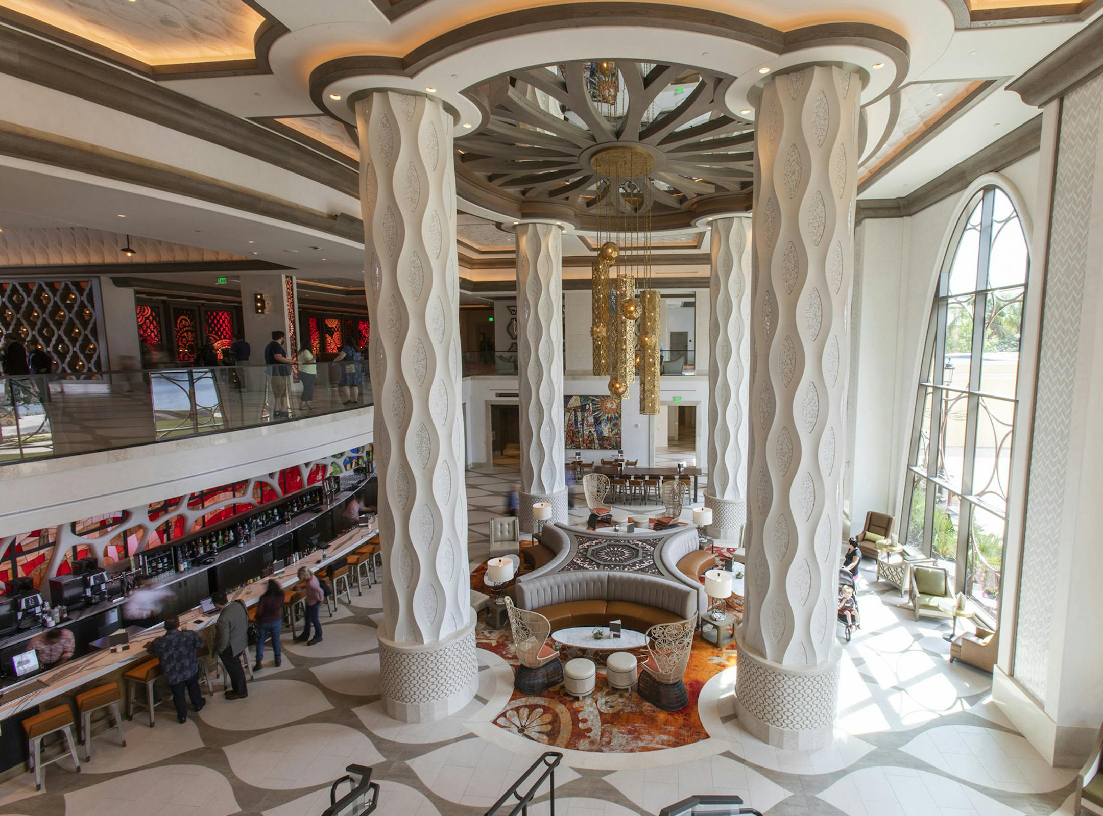 Guests at a preview of the new Gran Destino Tower at Disney's Coronado Springs Resort are welcomed into a stunning two-level lobby at Walt Disney World Resort in Lake Buena Vista, Fla. (Steven Diaz/Walt Disney World/TNS)