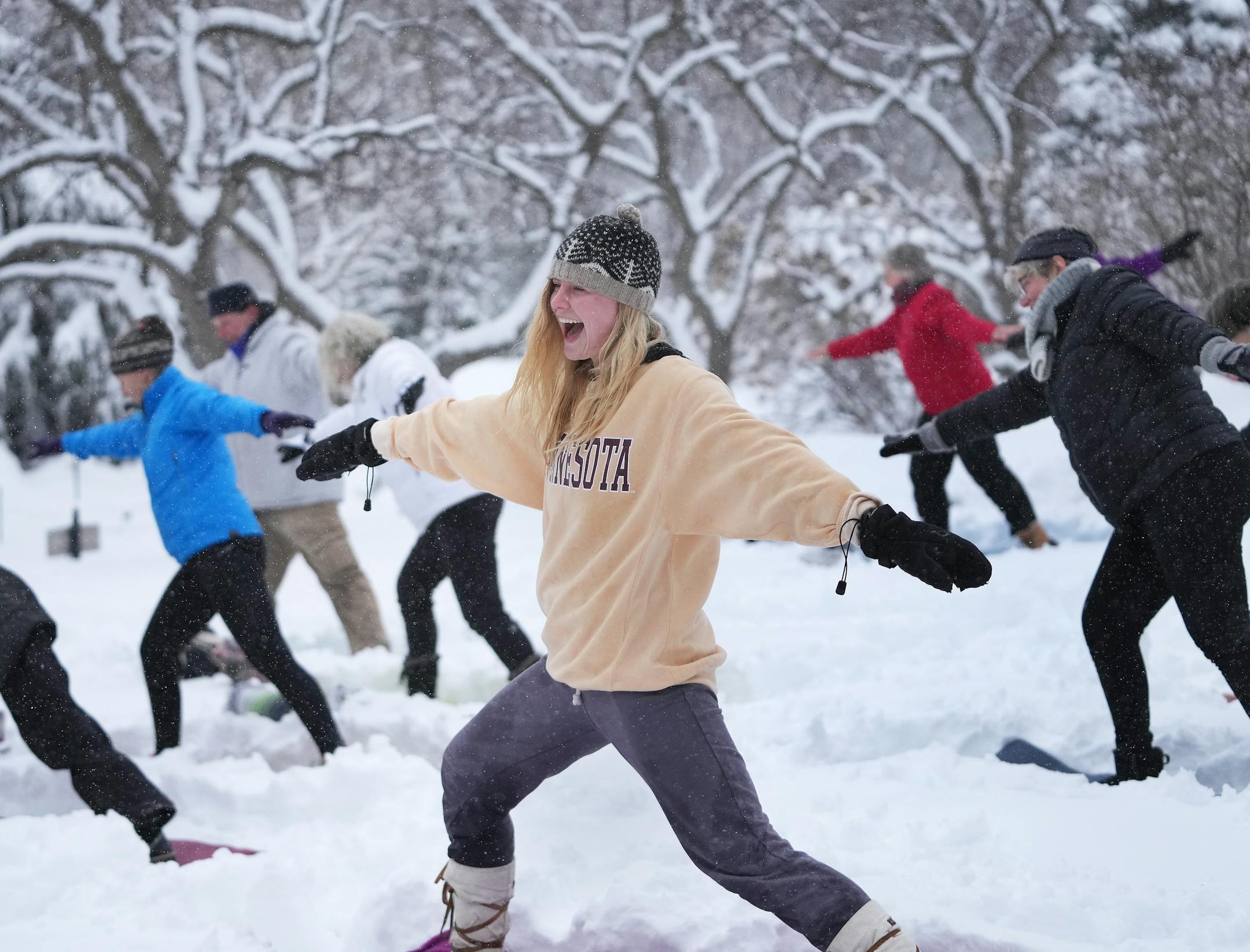 Perhaps only in Minnesota do you mix snow and yoga to come up with Snowga as part of the Yoga in the Gardens series at the Lilac Walk in the Minnesota Landscape Arboretum.