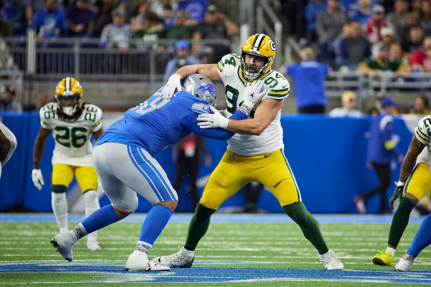 Detroit Lions offensive tackle Penei Sewell (58) blocks Green Bay Packers defensive end Dean Lowry (94) during an NFL football game, Sunday, Nov. 6, 2022, in Detroit. (AP Photo/Rick Osentoski)