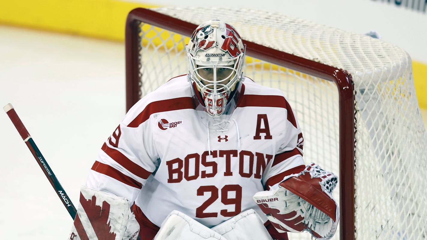 Boston University's Drew Commesso during the first period of an NCAA hockey game against Western Michigan University on Thursday, March 23, 2023, in Manchester, N.H. (AP Photo/Greg M. Cooper)