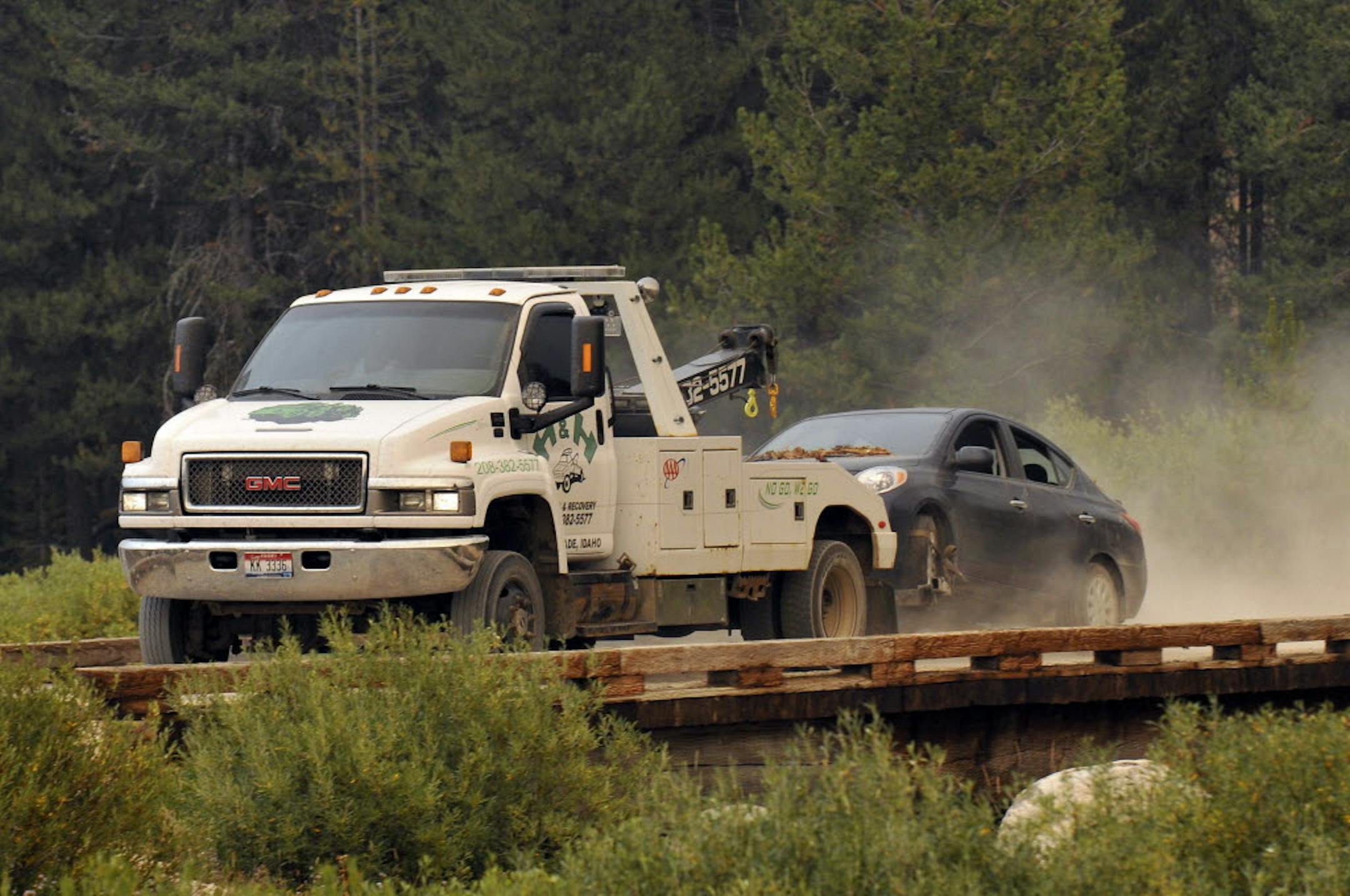 James Dimaggio's car is towed to the town of Cascade after dectives finished searching it on a trail head bordering the Frank Church River of No Return Wilderness.