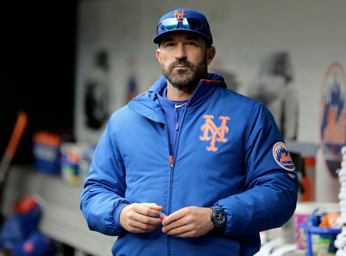 FILE - In this Sunday, April 28, 2019, file photo, then-New York Mets manager Mickey Callaway stands by the dugout before a baseball game against the Milwaukee Brewers at Citi Field, in New York. Callaway, former manager of the New York Mets and current Los Angeles Angels pitching coach, "aggressively pursued" several women who work in sports media and sent three of them inappropriate photos, The Athletic reported Monday, Feb. 1, 2021. (AP Photo/Seth Wenig, File)