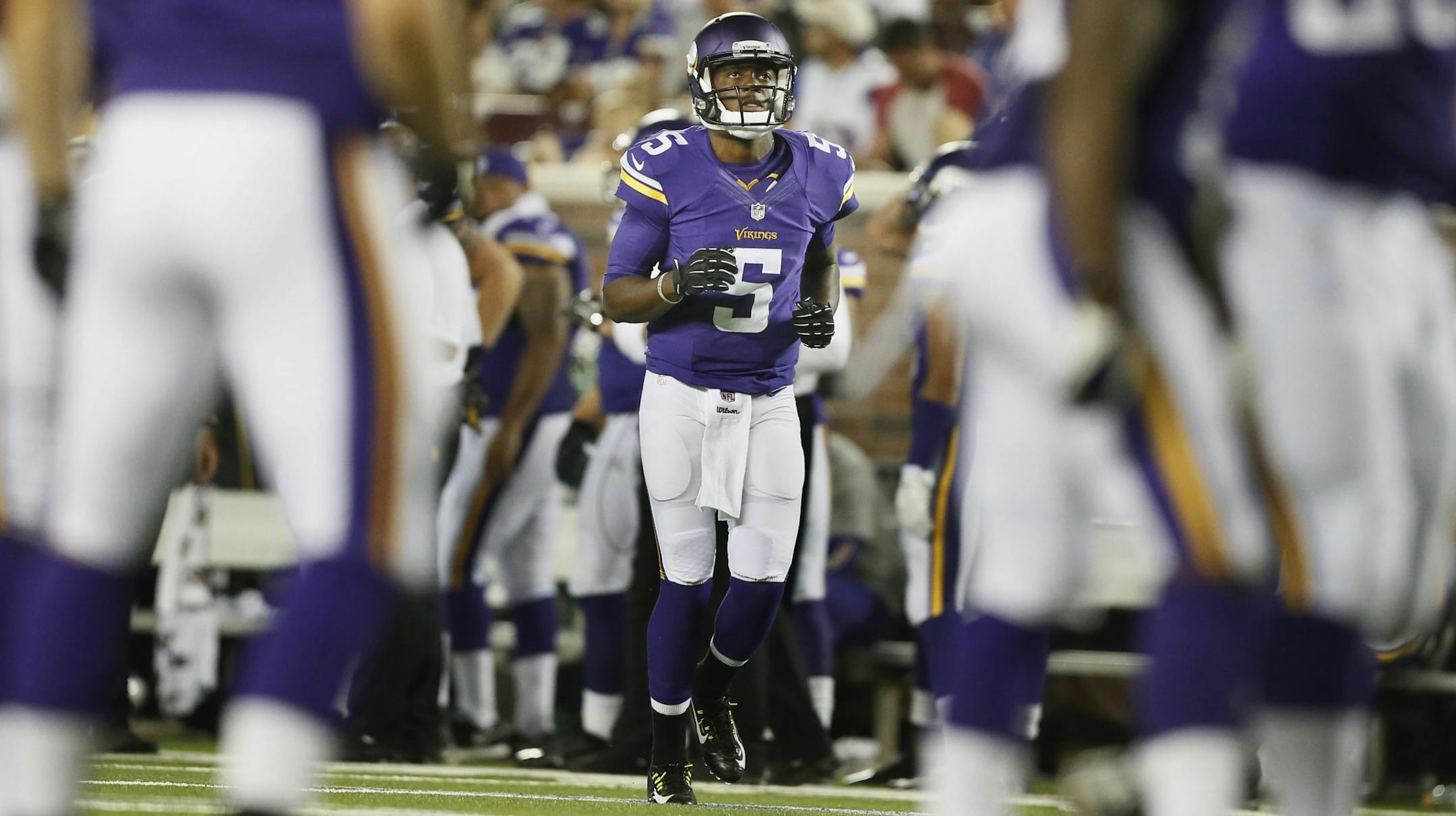 Minnesota Vikings quarterback Teddy Bridgewater (5) in the 4th quarter during NFL pre-season action between the Minnesota Vikings and the Arizona Cardinals at TCF Bank Stadium Saturday August 16 , 2014 in Minneapolis MN .