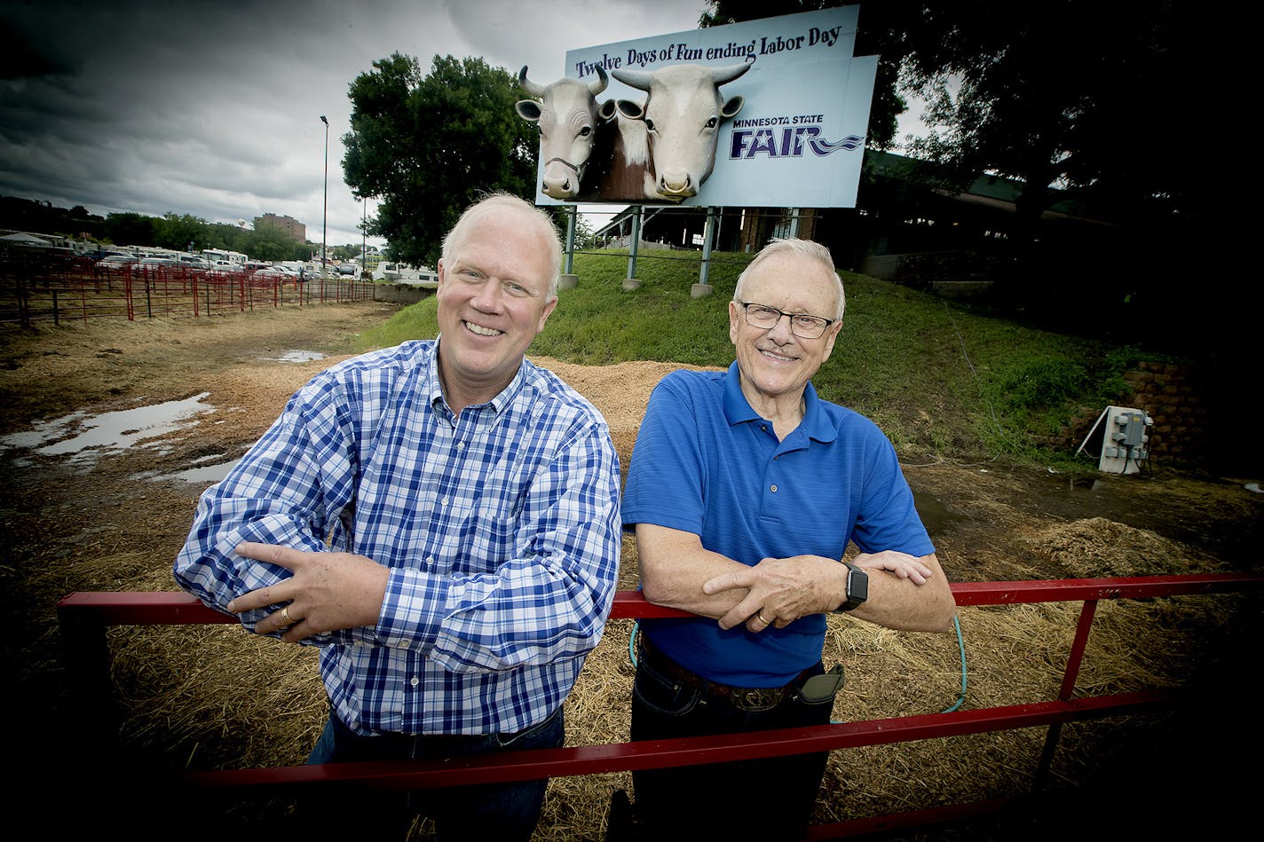 William Ewald and his father, Doug Ewald, are leading an effort to restore a billboard that features a pair of jutting Guernsey cows that were beloved and recognizable to generations of Twin Citians, going back to the first sign that was erected at the dairy in 1954. The effort could cost $50,000, including mooooving the billboard from its spot at the entrance to the State Fair, where it has been since 1984. Here the two were photographed Monday, August 28, 2017 at the State Fair in St. Paul, MN