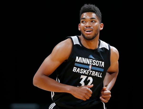 In this file photo from July, Minnesota Timberwolves first round draft pick Karl-Anthony Towns ran the court during a team scrimmage at Target Center.