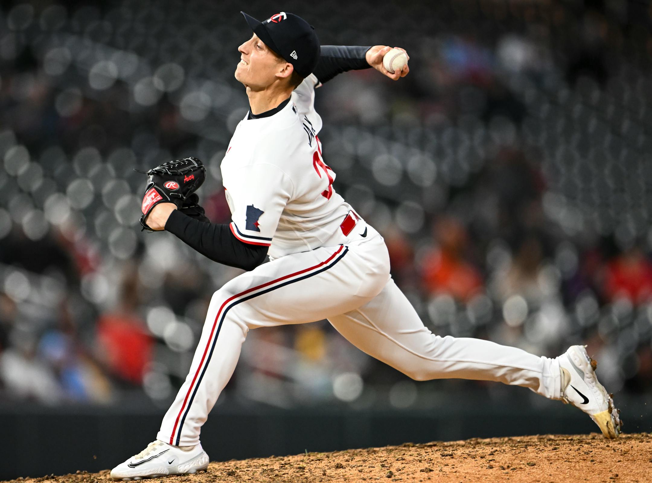 Minnesota Twins relief pitcher Griffin Jax throws a pitch against the New York Yankees in the top of the 8th inning.
