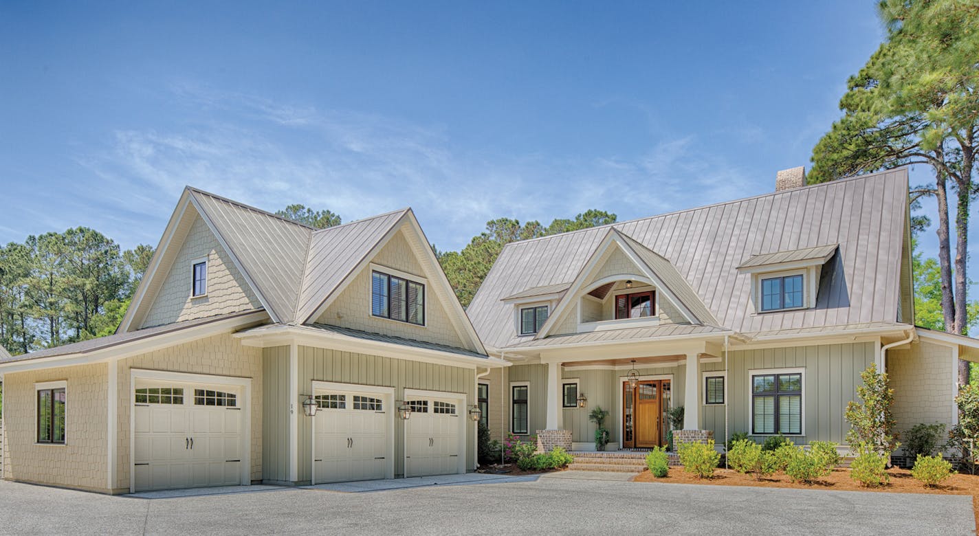 A little bit country: A sheltered porch and dormers add country-style curb appeal. PLAN032617