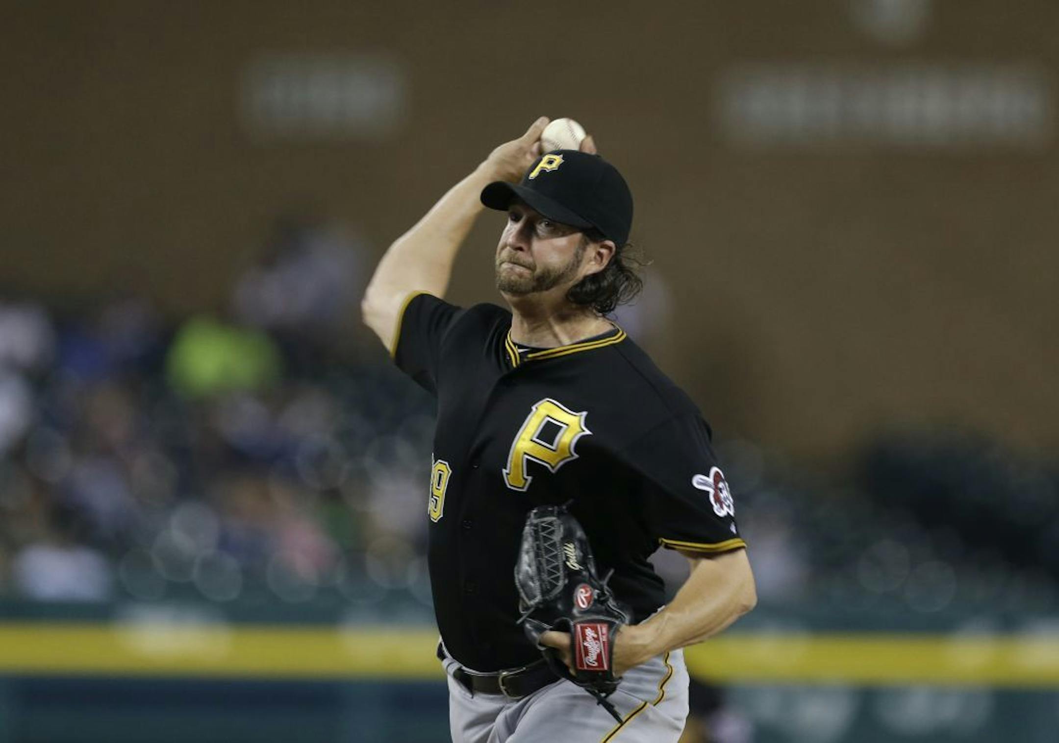 Pittsburgh Pirates relief pitcher Jason Grilli throws during the eleventh inning of an interleague baseball game against the Detroit Tigers in Detroit, Tuesday, May 28, 2013.