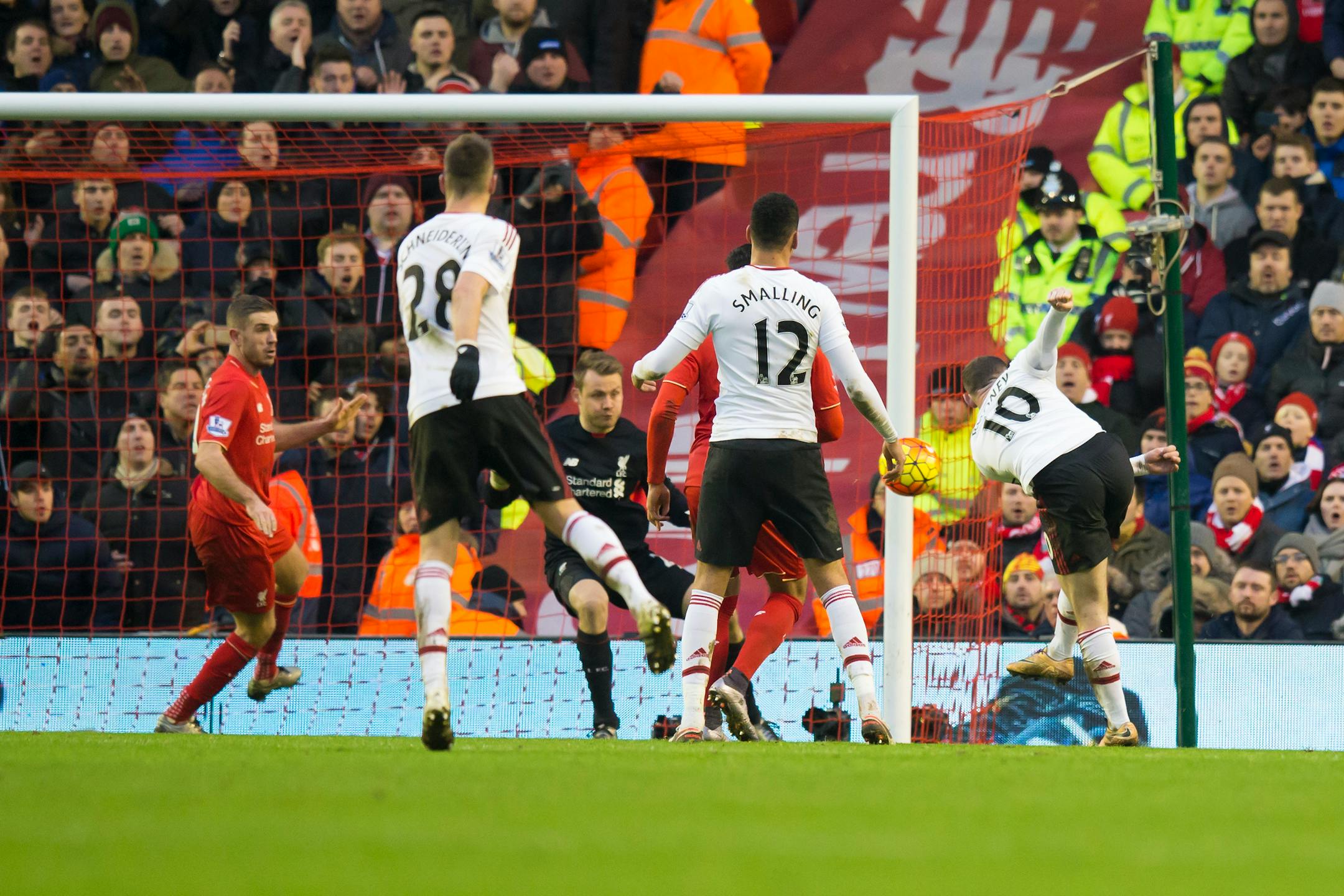 Manchester United's Wayne Rooney, right, scored the game's only goal during the English Premier League soccer match between Liverpool and Manchester United at Anfield Stadium in Liverpool, England, on Sunday.