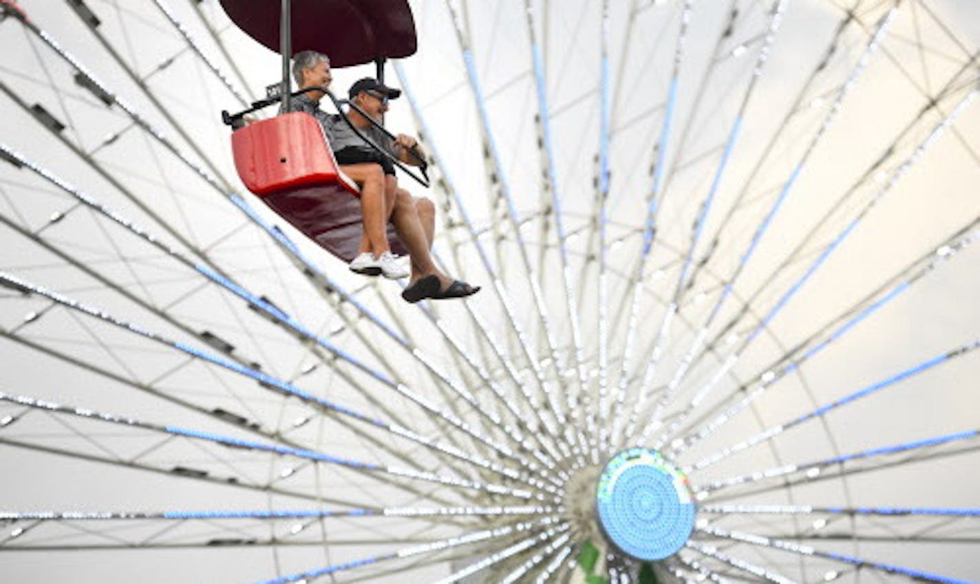 Fairgoers took a ride on the Sky Glider past the Great Big Wheel Thursday afternoon. ] AARON LAVINSKY &#x2022; aaron.lavinsky@startribune.com State Fair from the air photographed Thursday, Aug. 23, 2018 at the Minnesota State Fairgrounds in Falcon Heights, Minn.