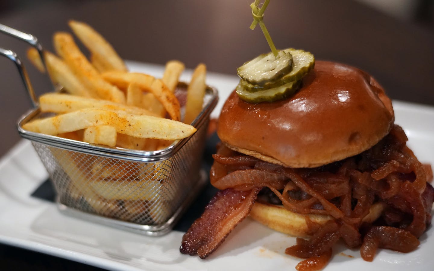 The bison burger with Dakota bison, applewood bacon, blue cheese, caramelized bbq onions, on a brioche bun] A full service restaurant from Jack Riebel (The Lexington,. Butcher & the Boar) and a spectacular new foodcourt with more local offerings are some of the big food changes at MSP Airport.RICHARD TSONG-TAATARII &#xa5; richard.tsong-taatarii@startribune.com